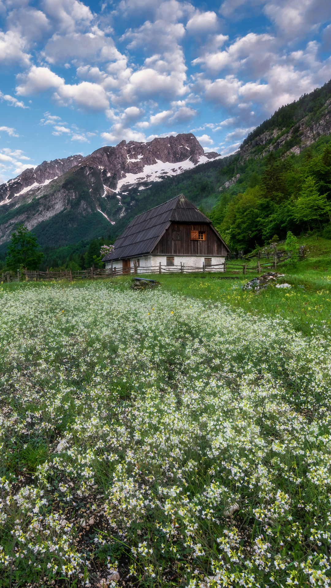 Download mobile wallpaper Mountain, Flower, House, Spring, Meadow, Cottage, Man Made for free.