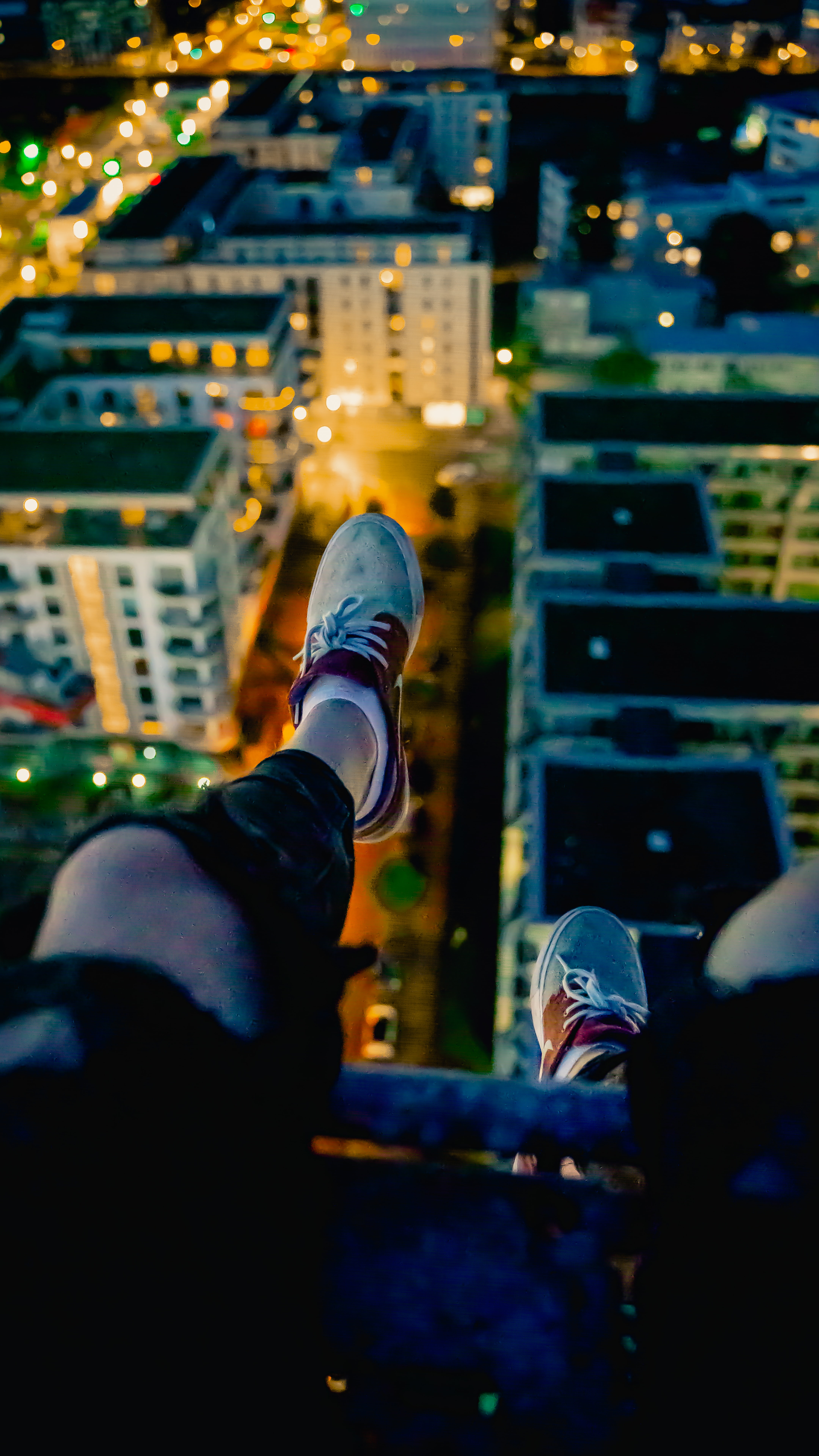 Download mobile wallpaper City, Miscellaneous, Lights, View From Above, Miscellanea, Legs, Sneakers for free.