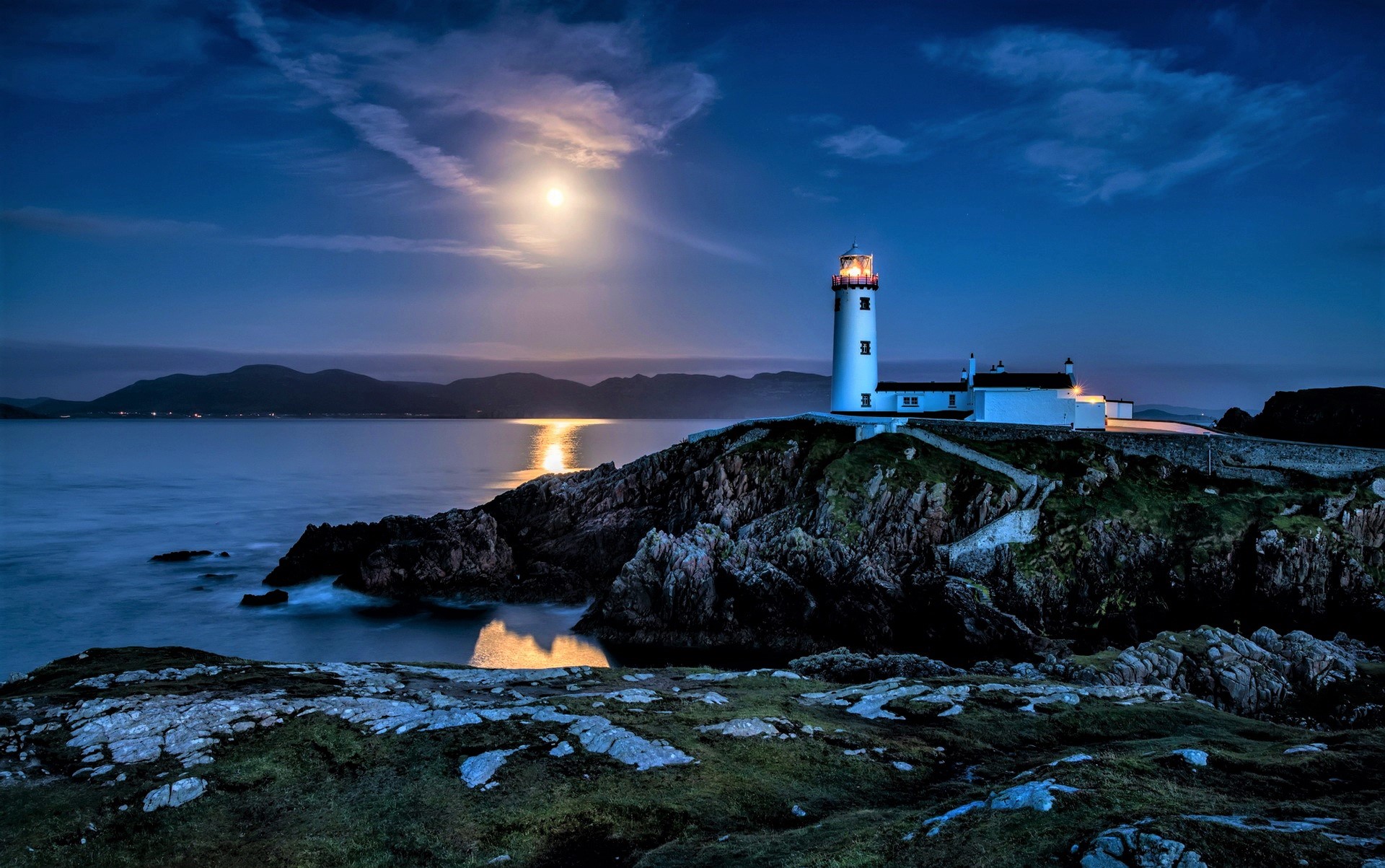 Download mobile wallpaper Sky, Night, Lighthouse, Man Made for free.