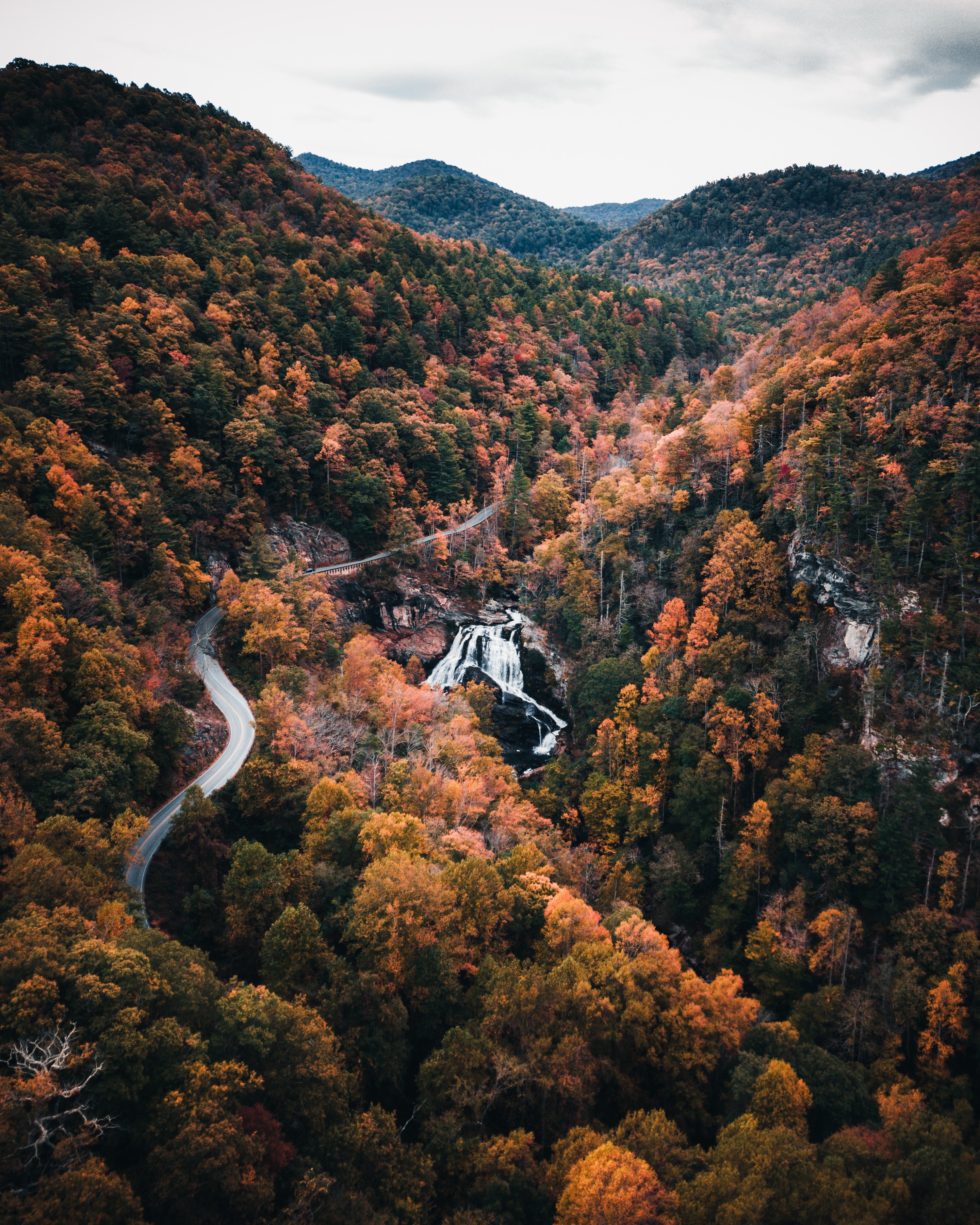 Download mobile wallpaper Autumn, Mountains, Trees, Road, Nature, View From Above for free.