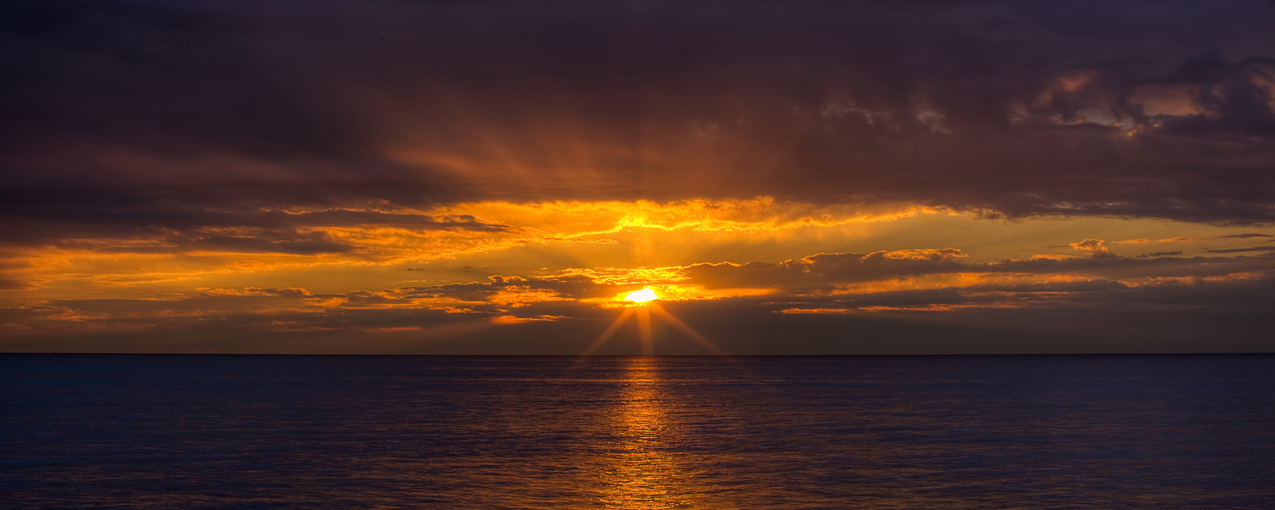 Download mobile wallpaper Sunset, Ocean, Earth for free.