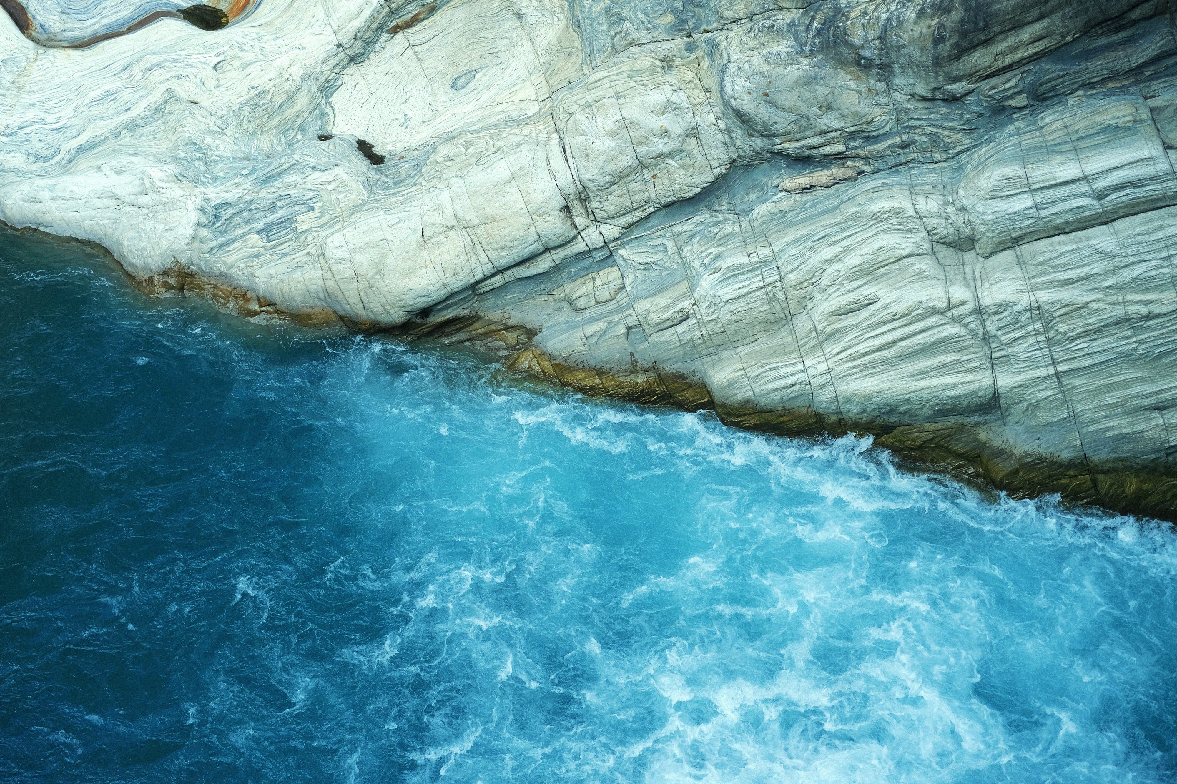 Free download wallpaper Water, Sea, Rocks, Coast, Wavy, Nature, Waves on your PC desktop