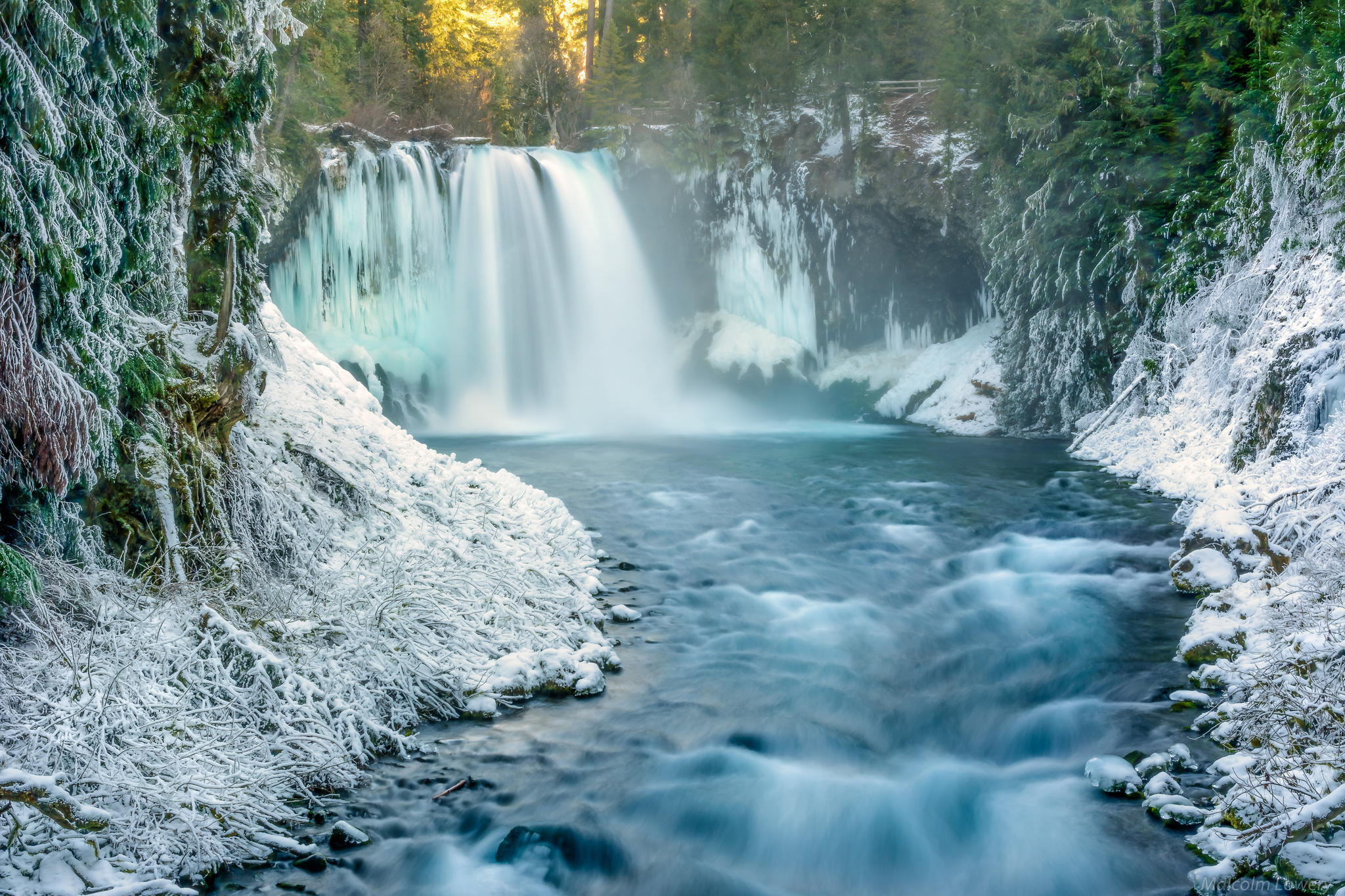 Download mobile wallpaper Winter, Waterfalls, Snow, Waterfall, Forest, Tree, Earth for free.