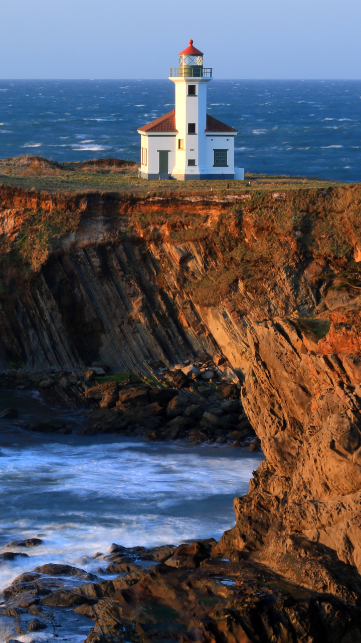 Download mobile wallpaper Ocean, Lighthouse, Man Made for free.