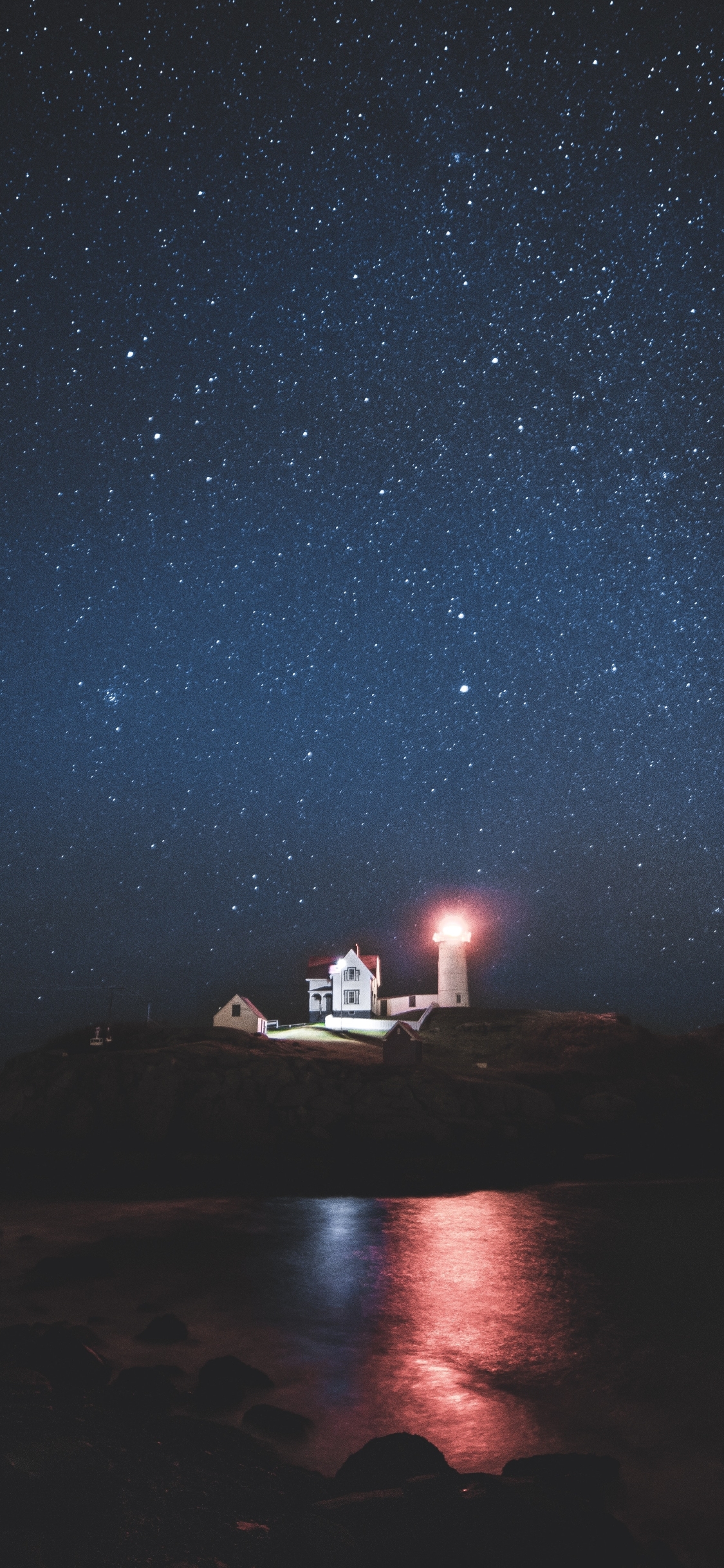 Download mobile wallpaper Sea, Night, Starry Sky, Lighthouse, Man Made for free.