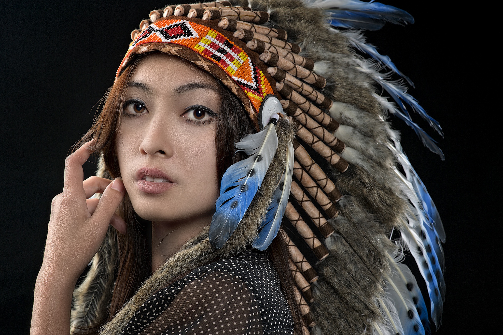 Download mobile wallpaper Feather, Face, Model, Women, Headdress, Asian, Brown Eyes, Native American for free.