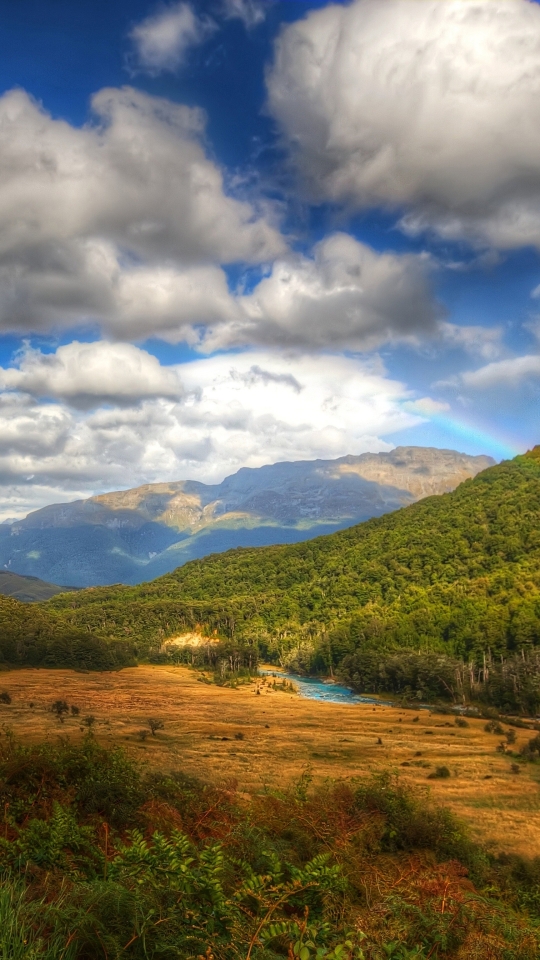 Download mobile wallpaper Landscape, Grass, Rainbow, Mountain, Road, Earth for free.