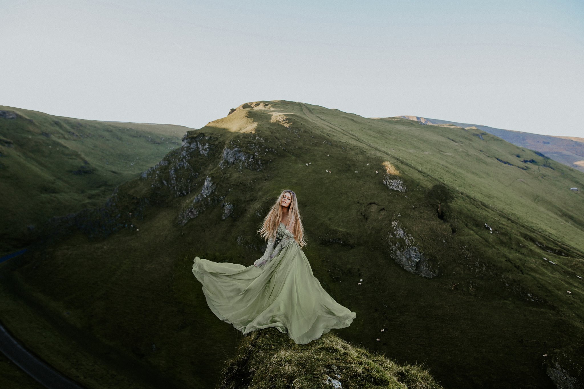 Download mobile wallpaper Mountain, Blonde, Photography, Women, Long Hair, Green Dress for free.