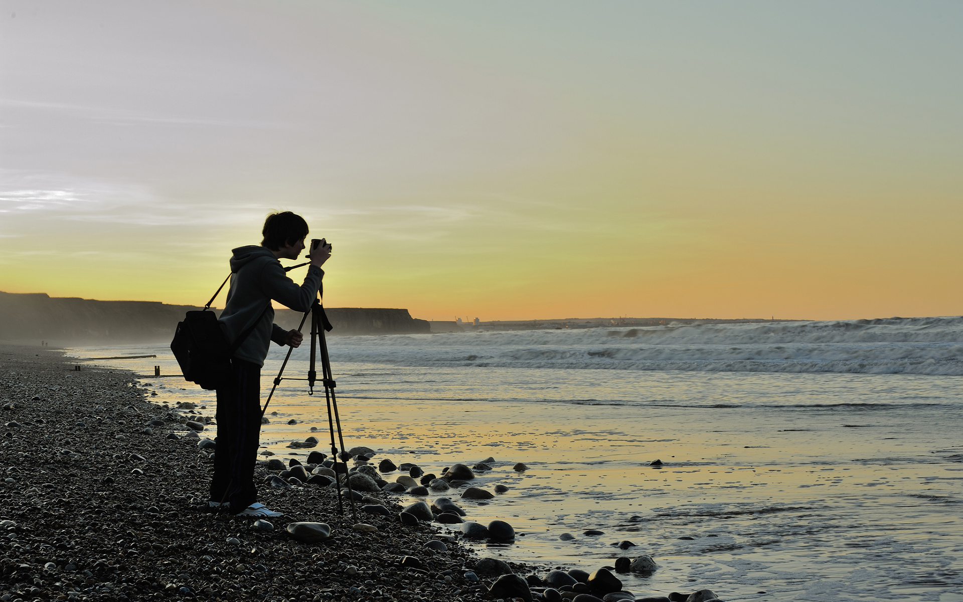 Download mobile wallpaper Sunset, Sky, Sea, Ocean, Camera, Man Made for free.