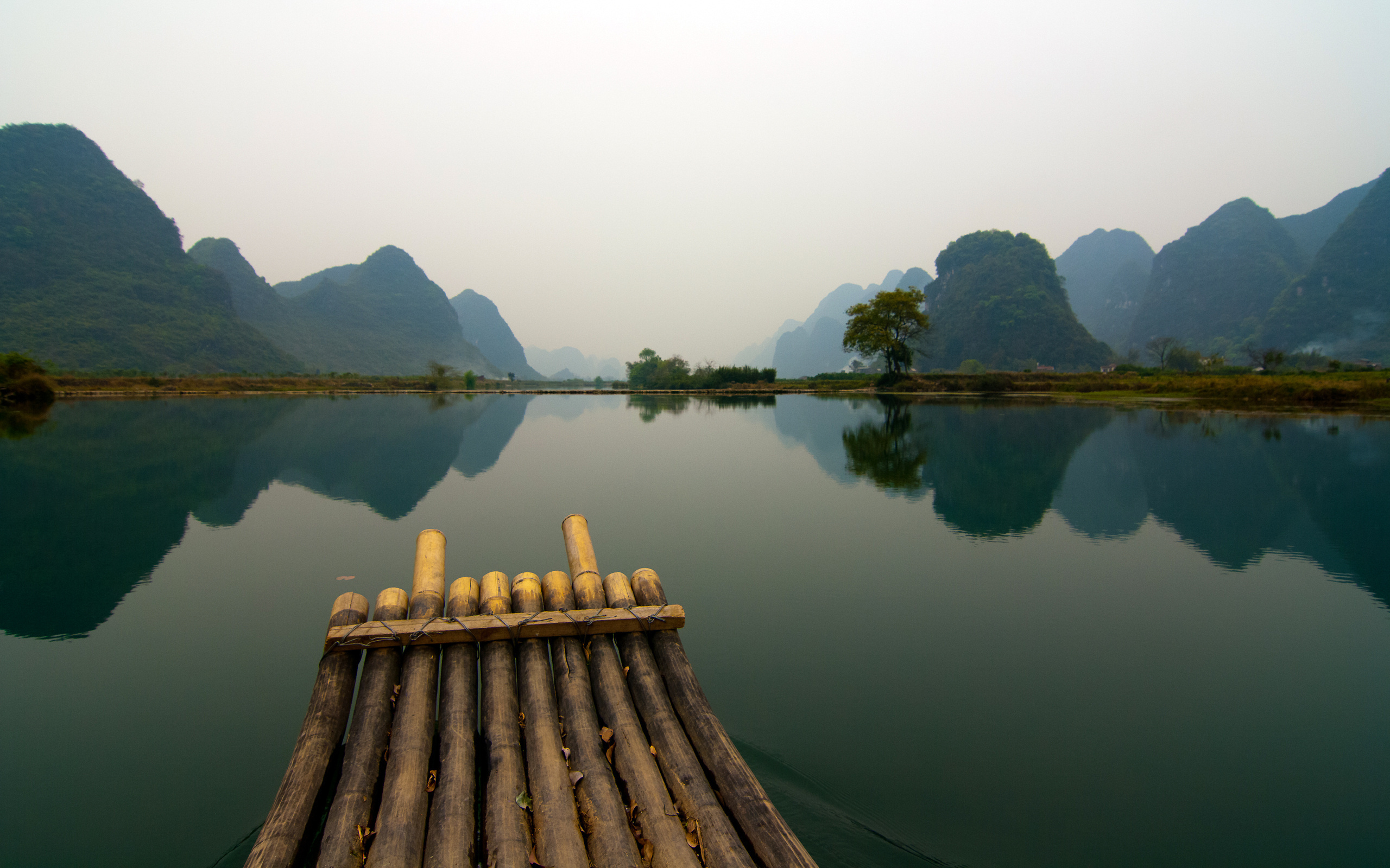 Download mobile wallpaper Landscape, Mountain, Lake, Reflection, Earth, Boat, Bamboo for free.