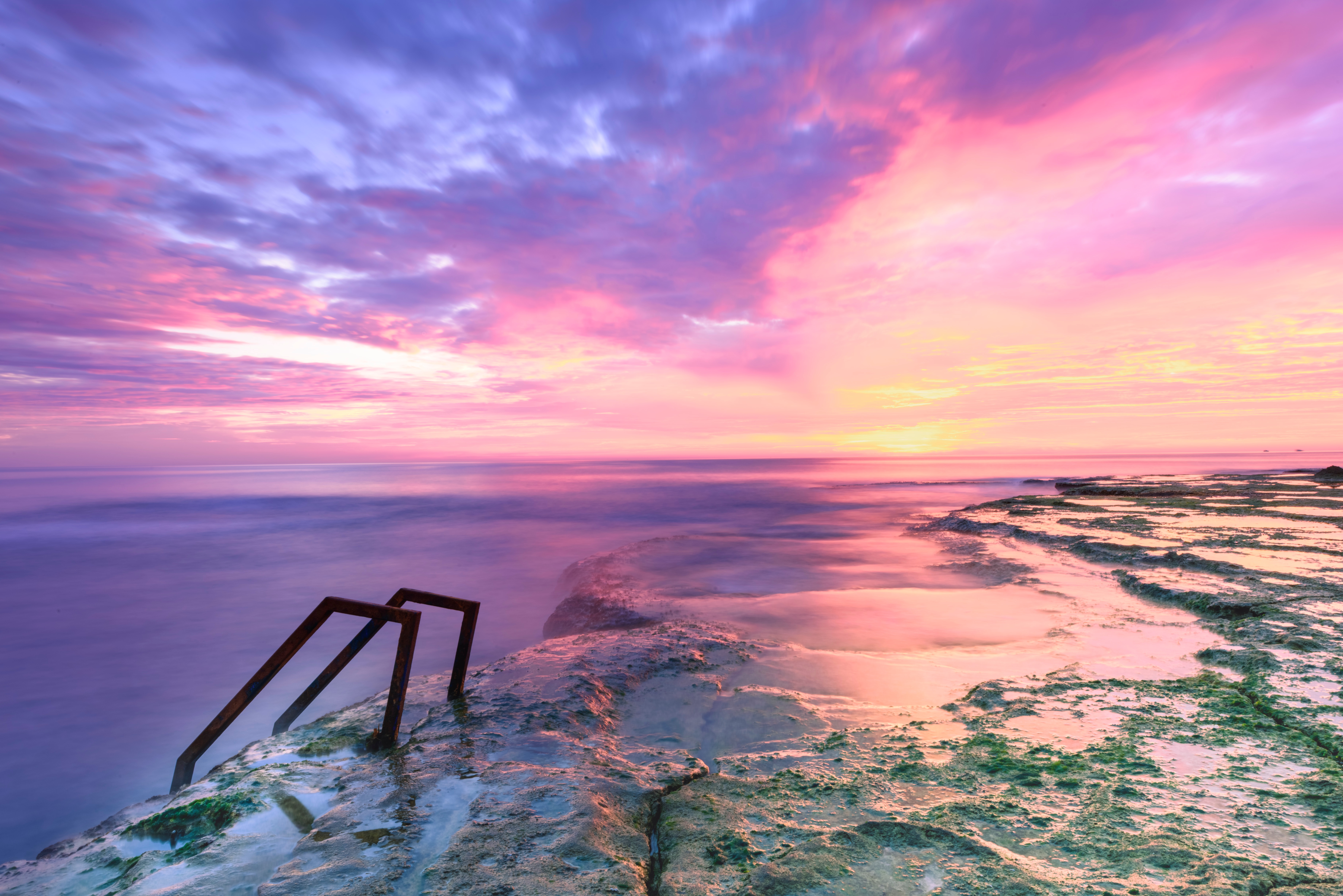 Download mobile wallpaper Sunset, Sky, Sea, Pink, Horizon, Ocean, Earth for free.