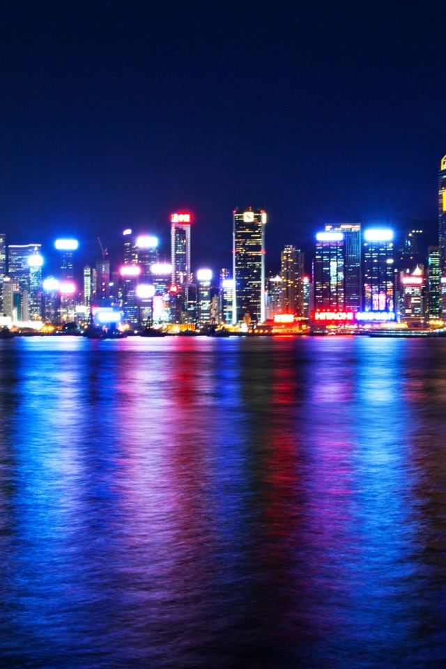 Download mobile wallpaper Cities, Night, City, Skyscraper, Building, Reflection, Light, Hong Kong, Man Made for free.