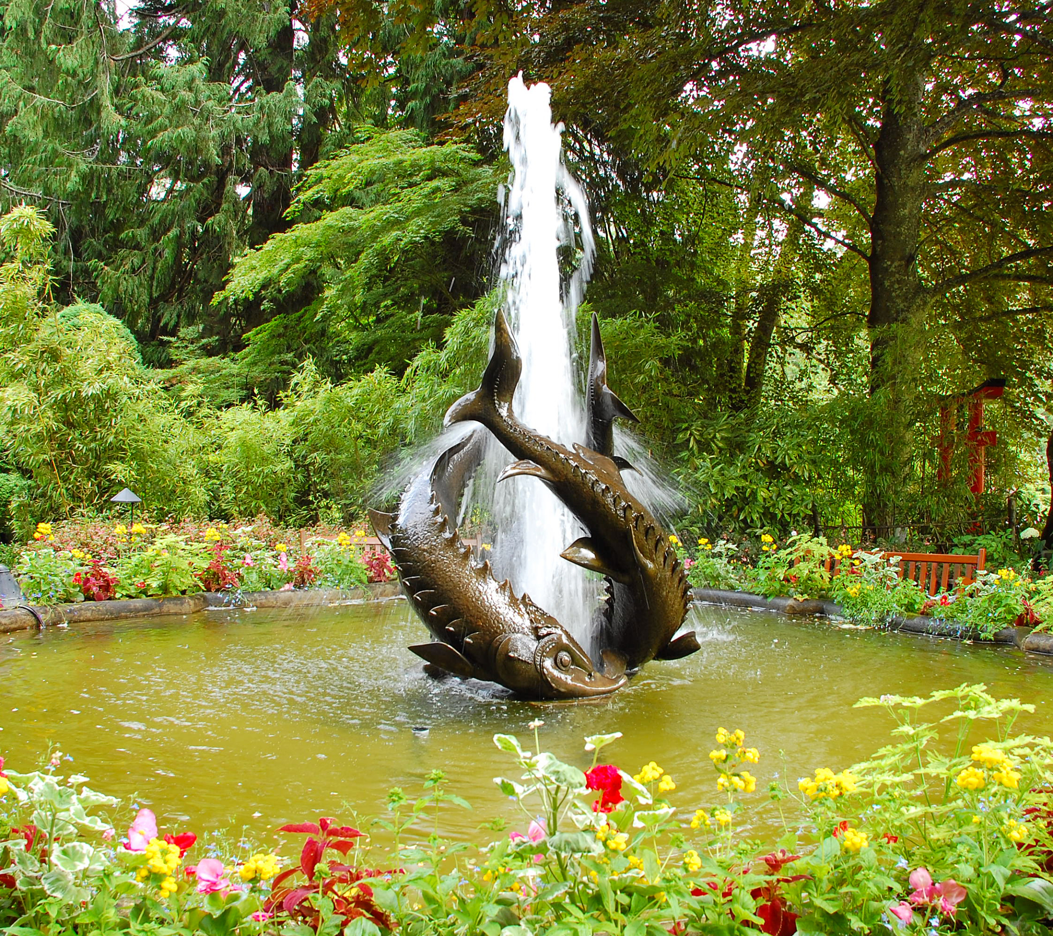 Download mobile wallpaper Water, Fountain, Flower, Park, Statue, Garden, Man Made for free.