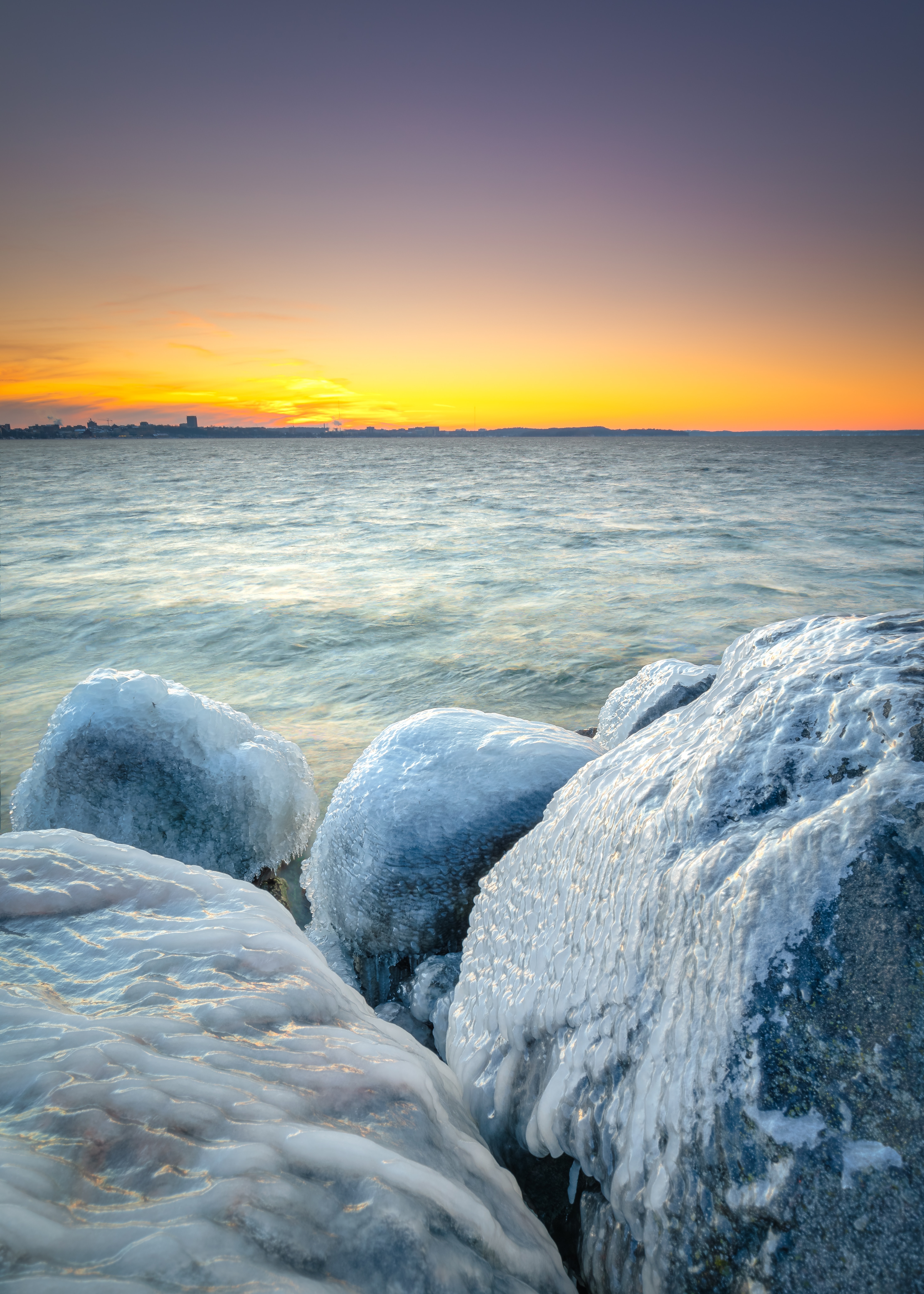 Download mobile wallpaper Winter, Coast, Stones, Frozen, Ice, Nature for free.
