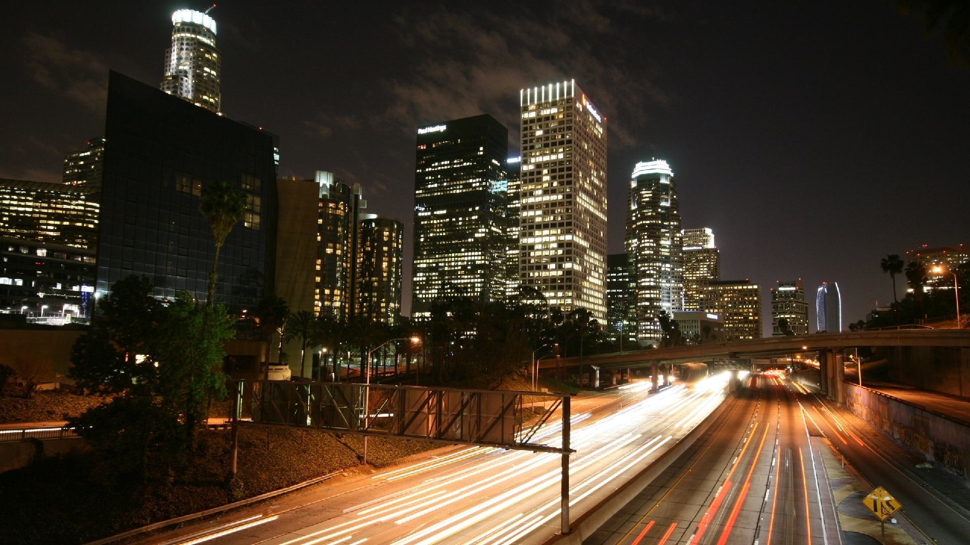 Скачать картинку Ночь, Город, Огни, Лос Анджелес, Строительство, Сделано Человеком, Промежуток Времени в телефон бесплатно.