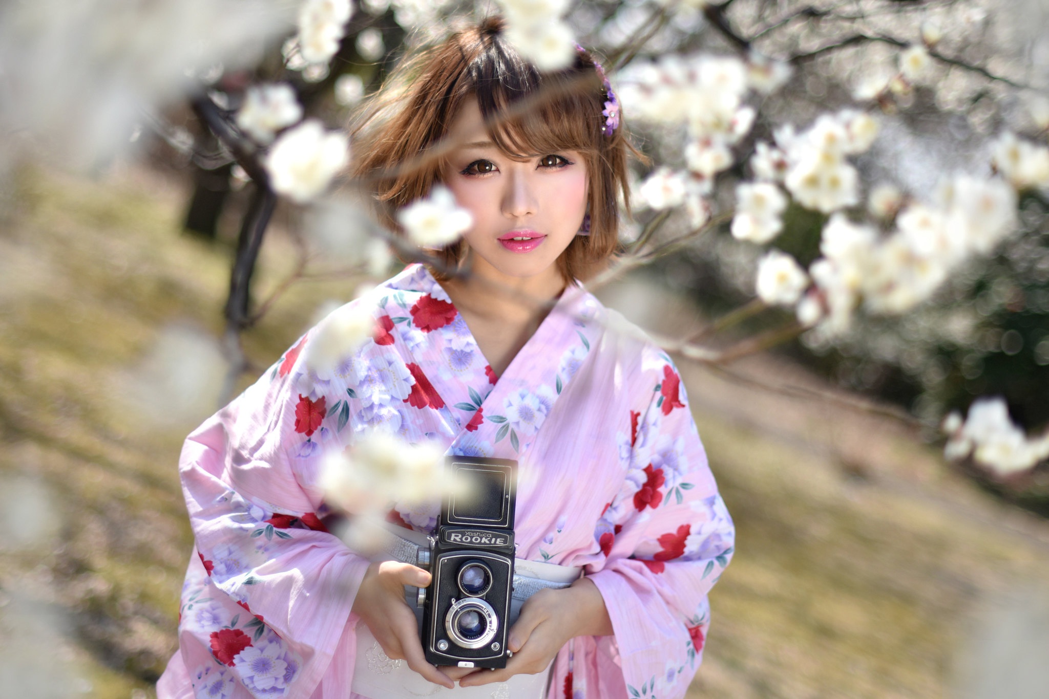 Download mobile wallpaper Camera, Kimono, Brunette, Women, Blossom, Asian, Short Hair, Depth Of Field for free.