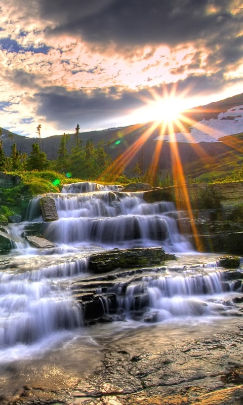 Download mobile wallpaper Sun, Waterfalls, Mountain, Waterfall, Sunrise, Earth, Stream for free.