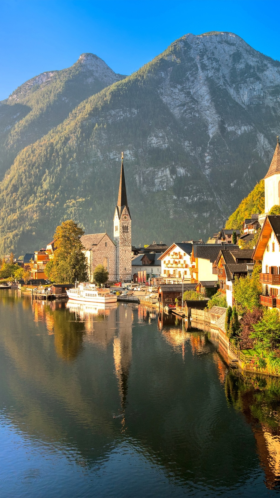 Download mobile wallpaper Mountain, House, Austria, Church, Hallstatt, Man Made, Towns for free.