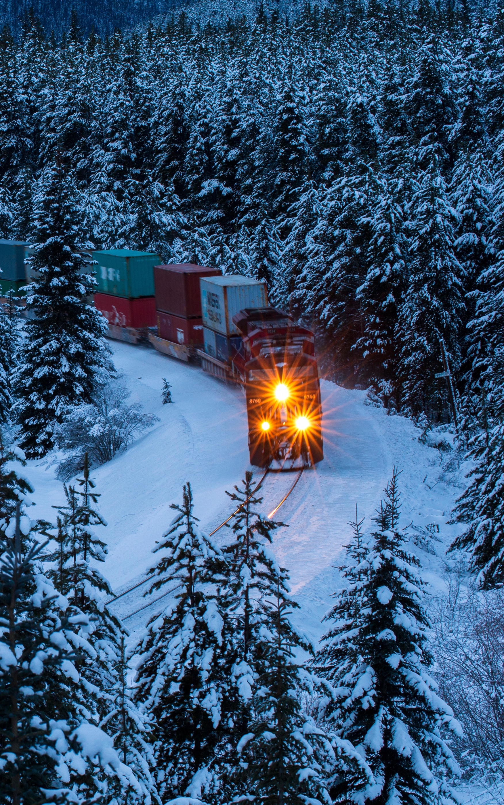 Download mobile wallpaper Winter, Canada, Train, Vehicles for free.