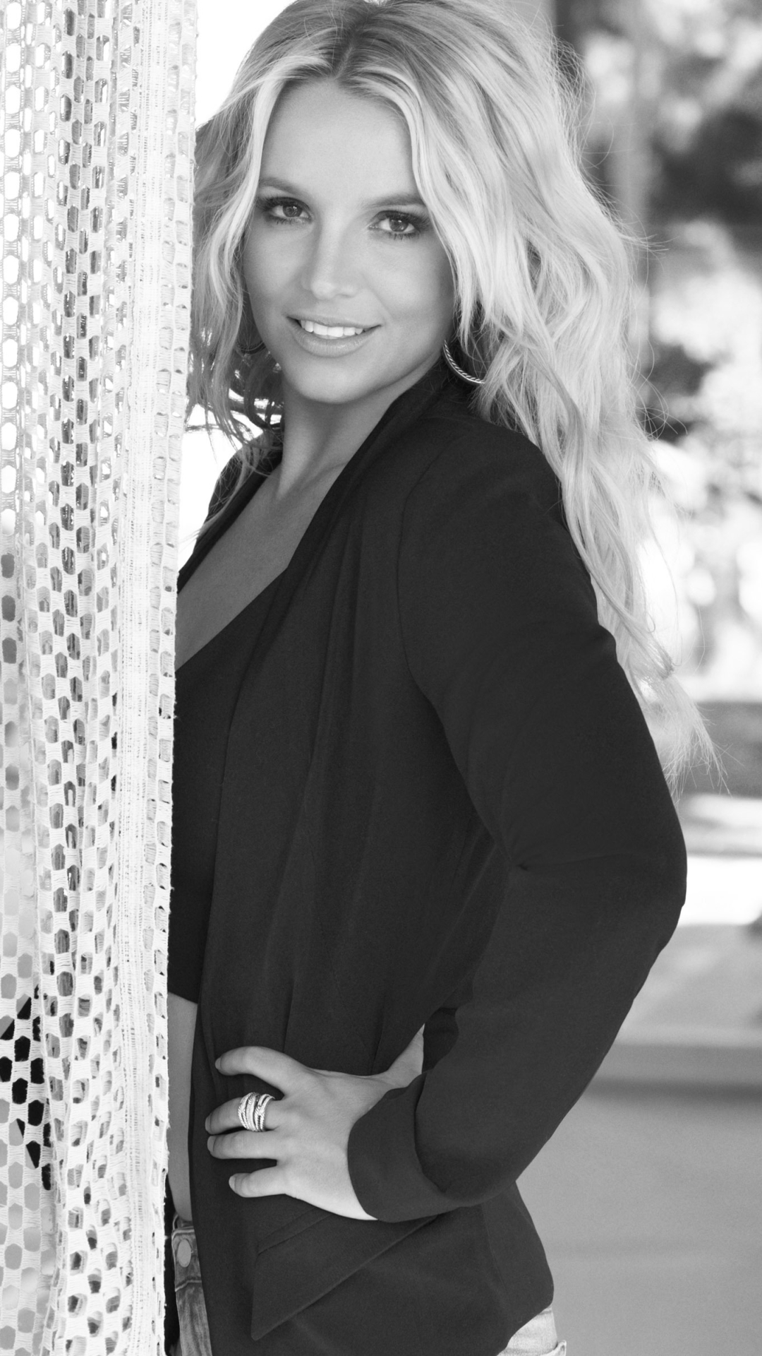 Download mobile wallpaper Music, Britney Spears, Smile, Singer, Blonde, American, Black & White, Long Hair for free.
