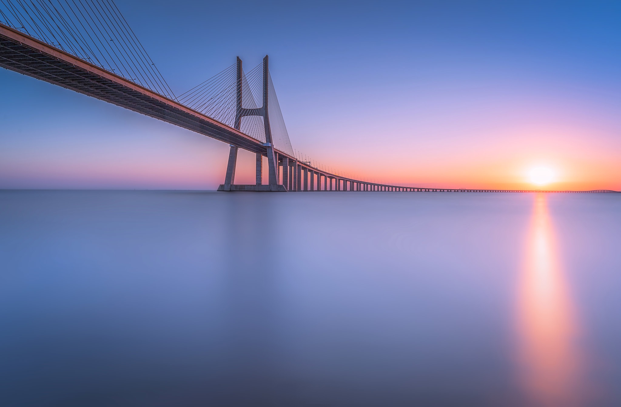 494261 скачать картинку лиссабон, португалия, сделано человеком, мост васко да гама, мост, река, река тежу, мосты - обои и заставки бесплатно