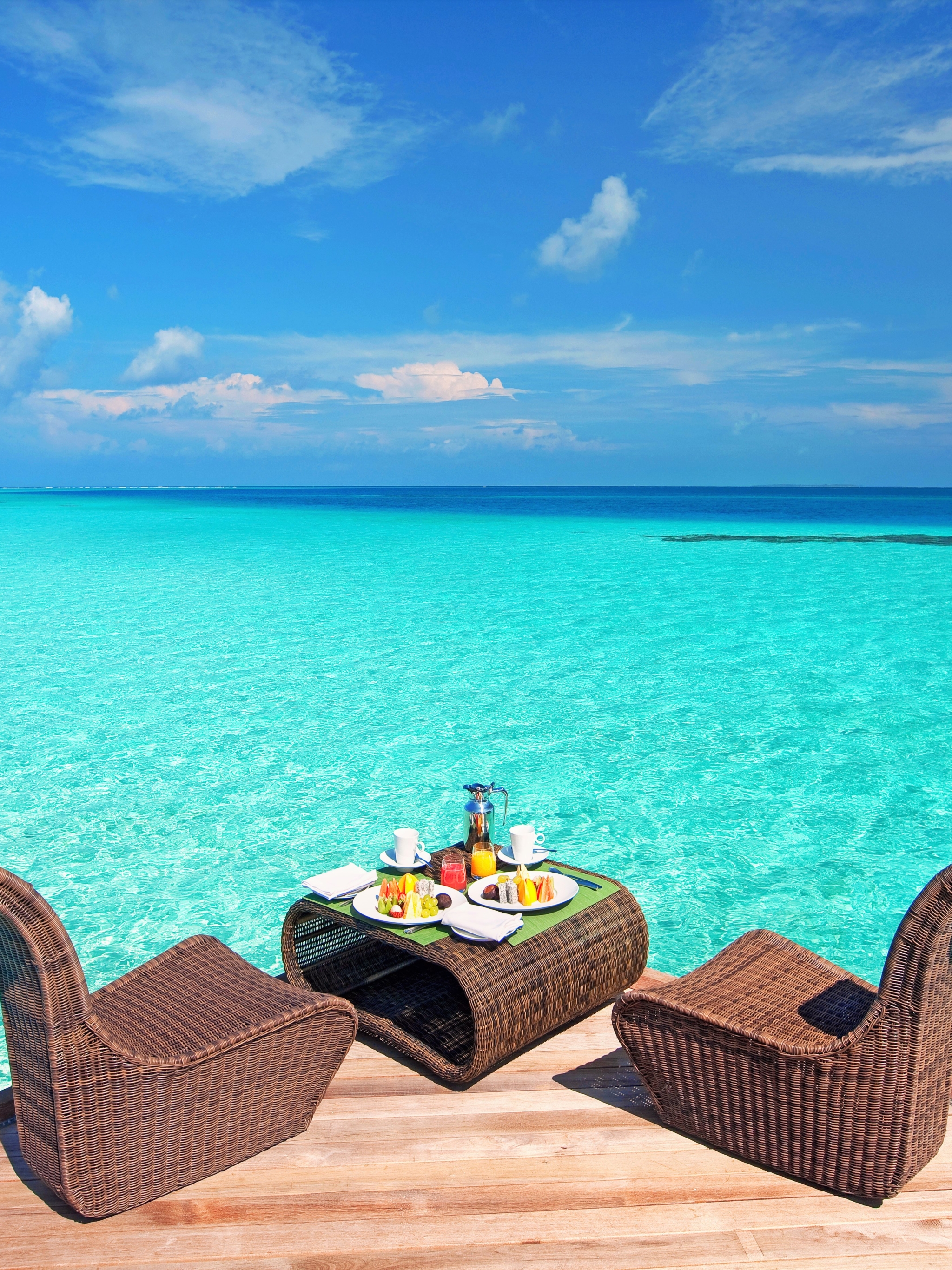 Download mobile wallpaper Sea, Horizon, Chair, Ocean, Tropical, Resort, Man Made for free.