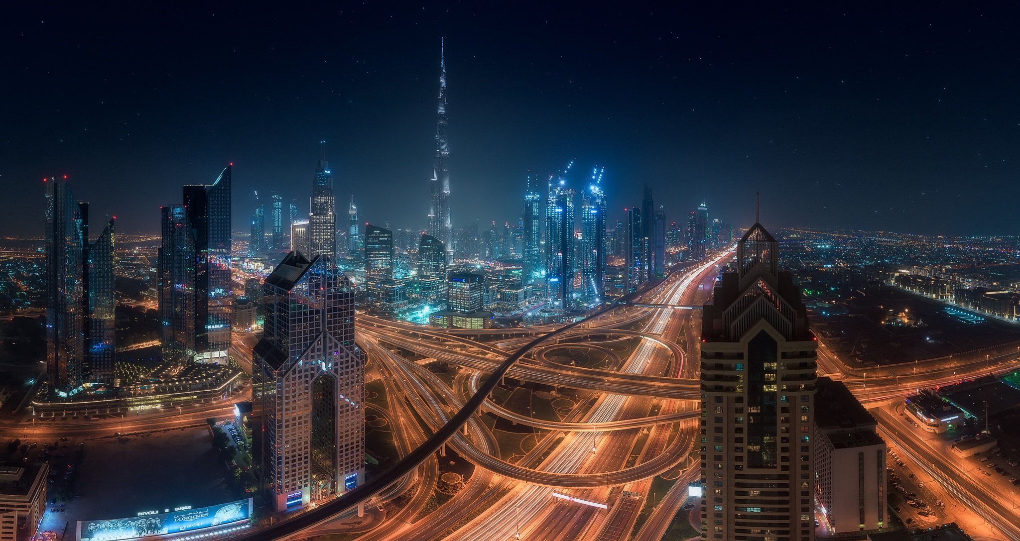 Free download wallpaper Cities, Night, City, Skyscraper, Building, Light, Dubai, United Arab Emirates, Highway, Man Made on your PC desktop