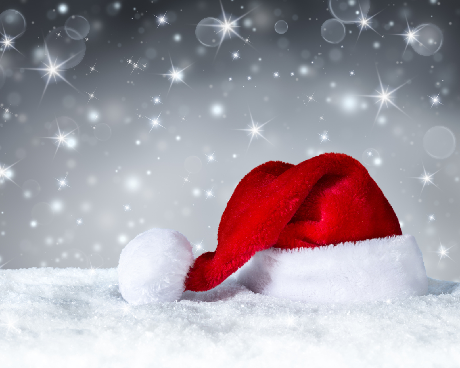 Handy-Wallpaper Feiertage, Sterne, Schnee, Weihnachten, Weihnachtsmütze kostenlos herunterladen.