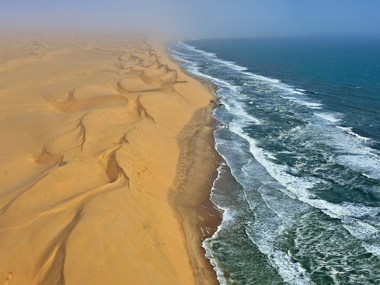 Скачать картинку Песок, Волны, Пейзаж, Море, Пустыня в телефон бесплатно.