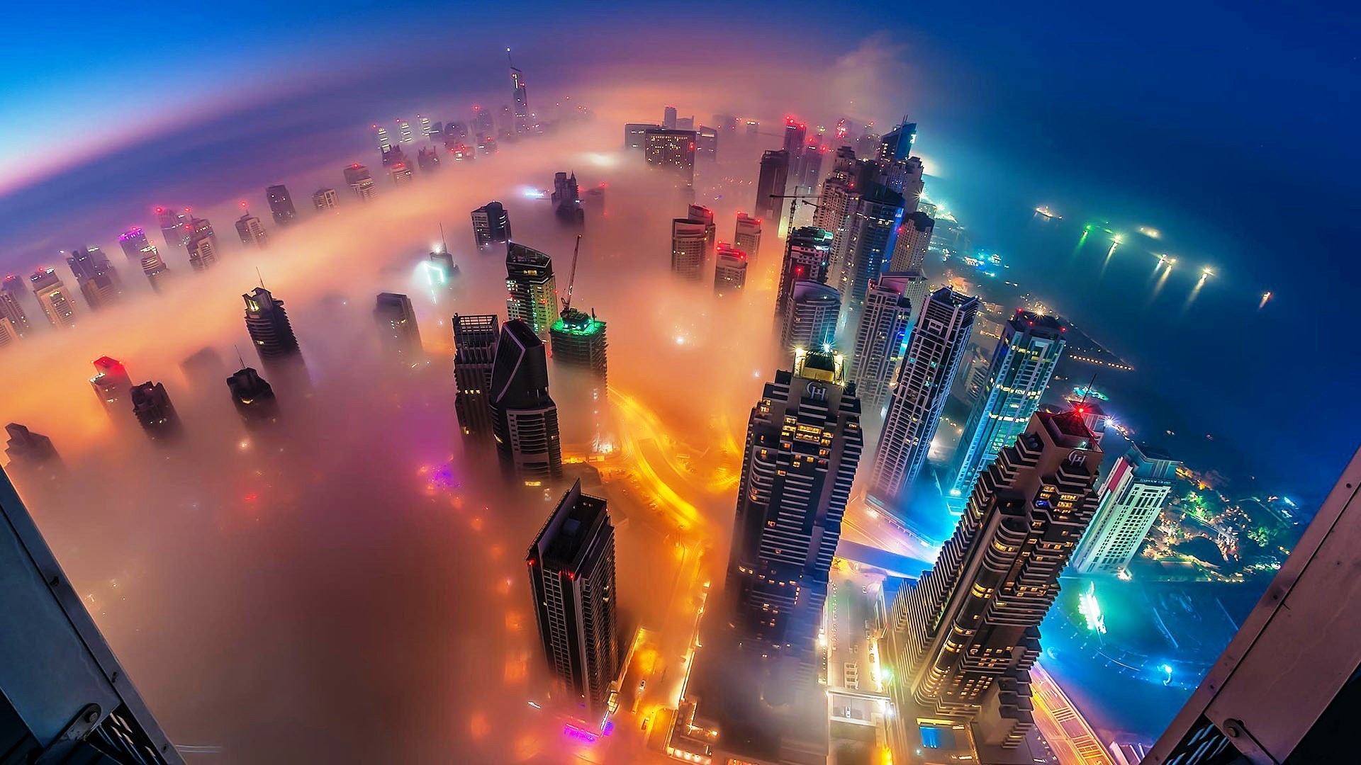 Descarga gratuita de fondo de pantalla para móvil de Ciudad, Rascacielos, Edificio, Niebla, Hecho Por El Hombre, Dubái, Aéreo.