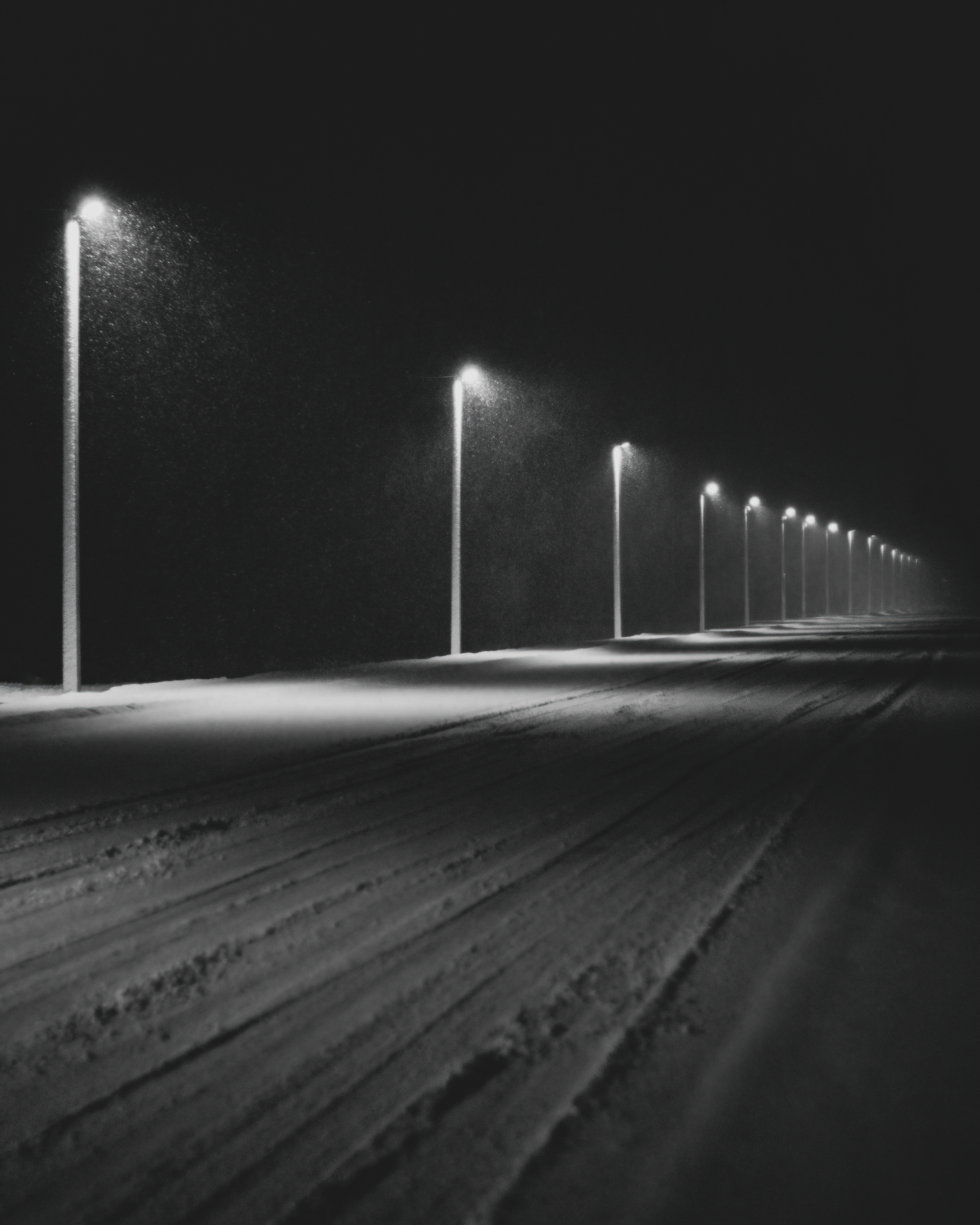 Download mobile wallpaper Lights, Road, Lanterns, Night, Snow, Dark for free.