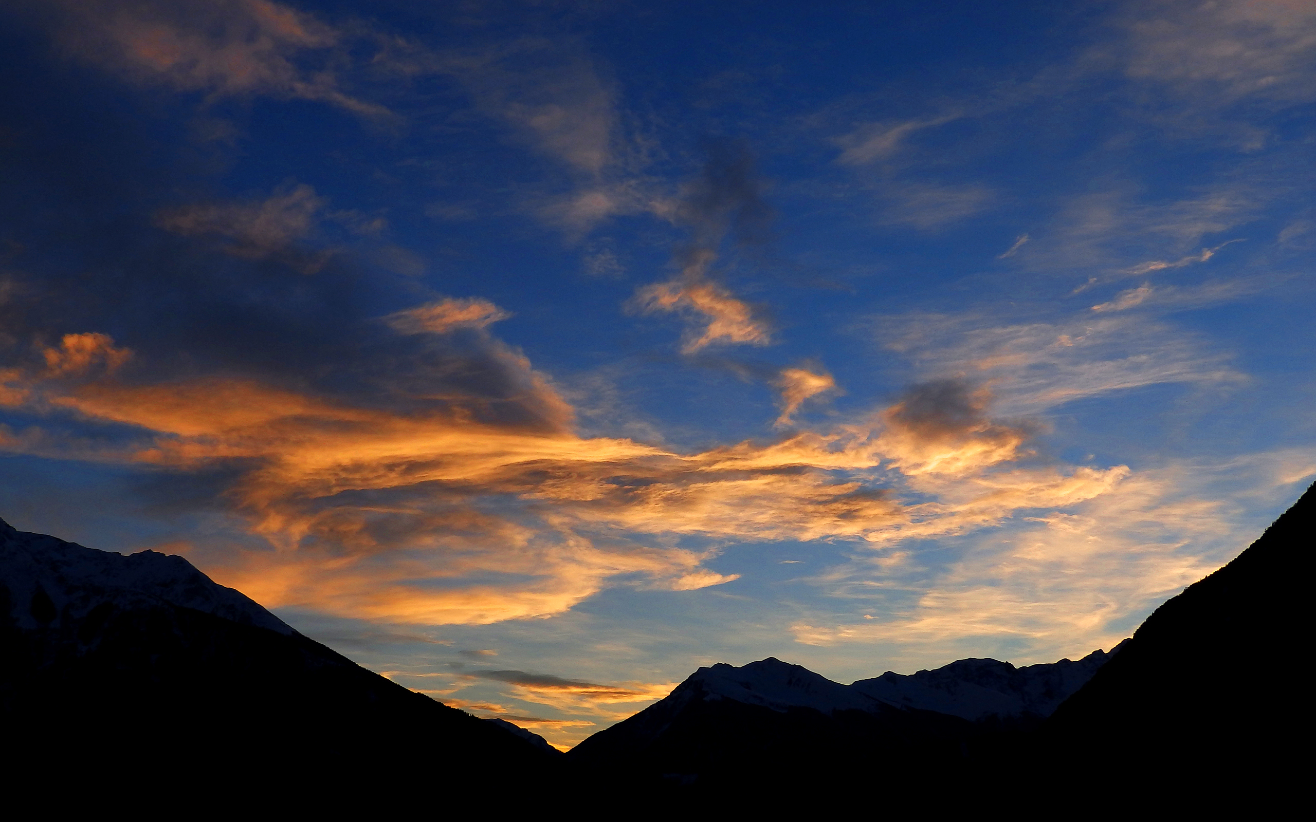 Download mobile wallpaper Sunset, Sky, Mountain, Earth, Cloud for free.