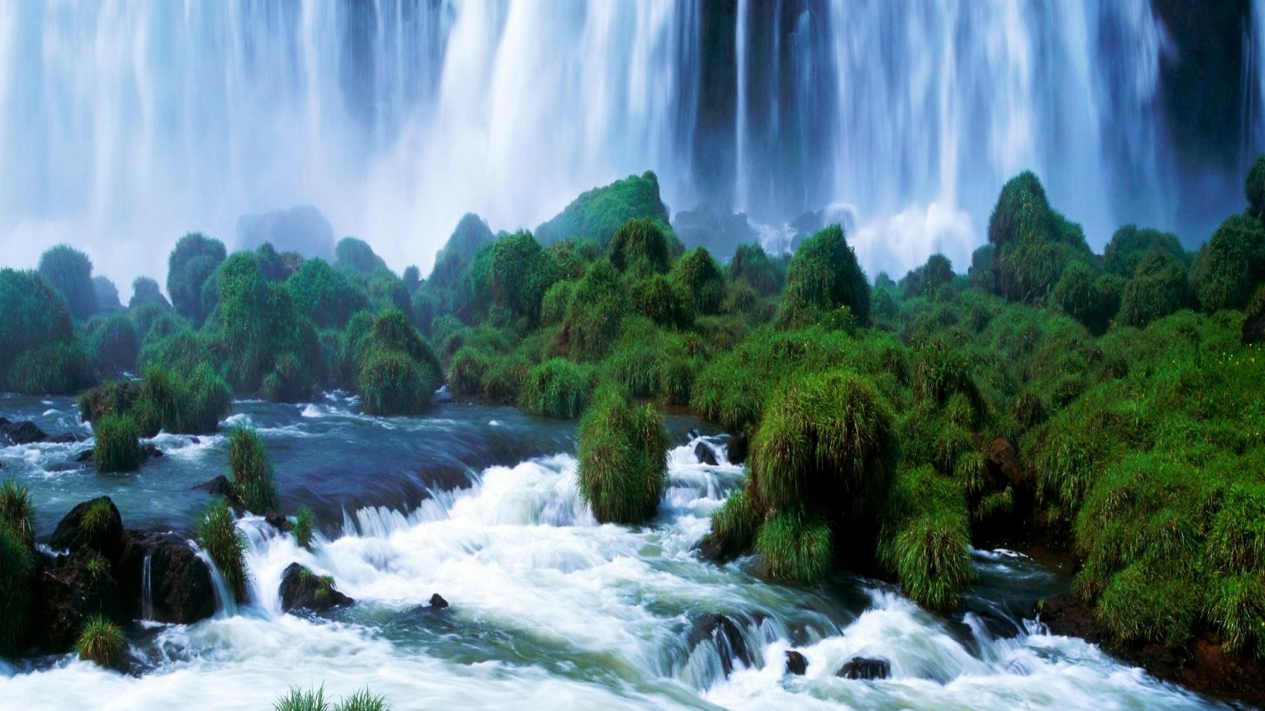 Скачать картинку Река, Водопад, Земля, Зеленый, Земля/природа в телефон бесплатно.