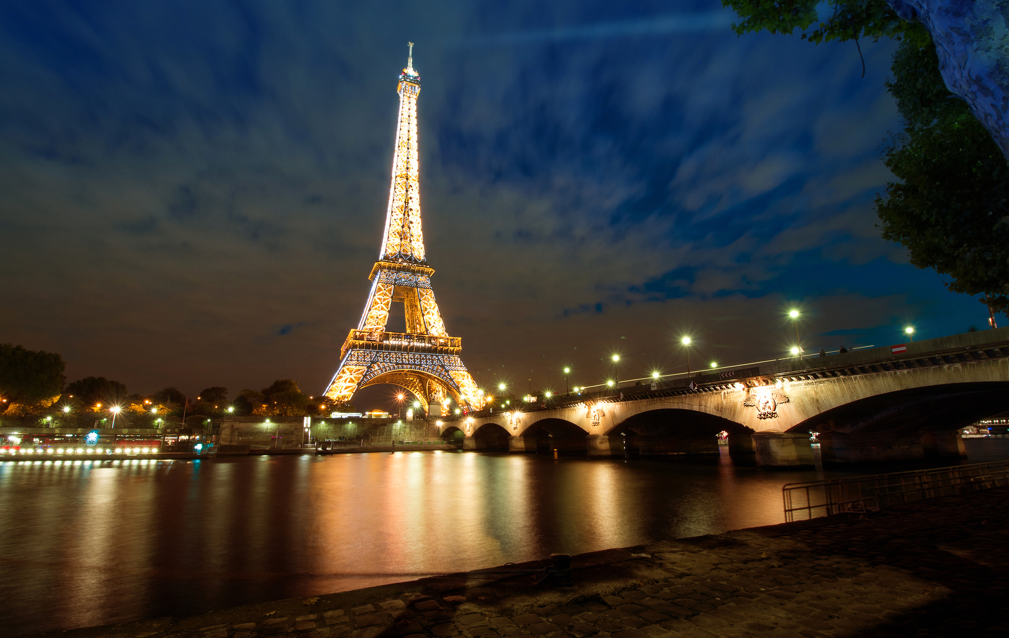 Download mobile wallpaper Night, Paris, Eiffel Tower, Monuments, Light, France, Bridge, Monument, Man Made for free.