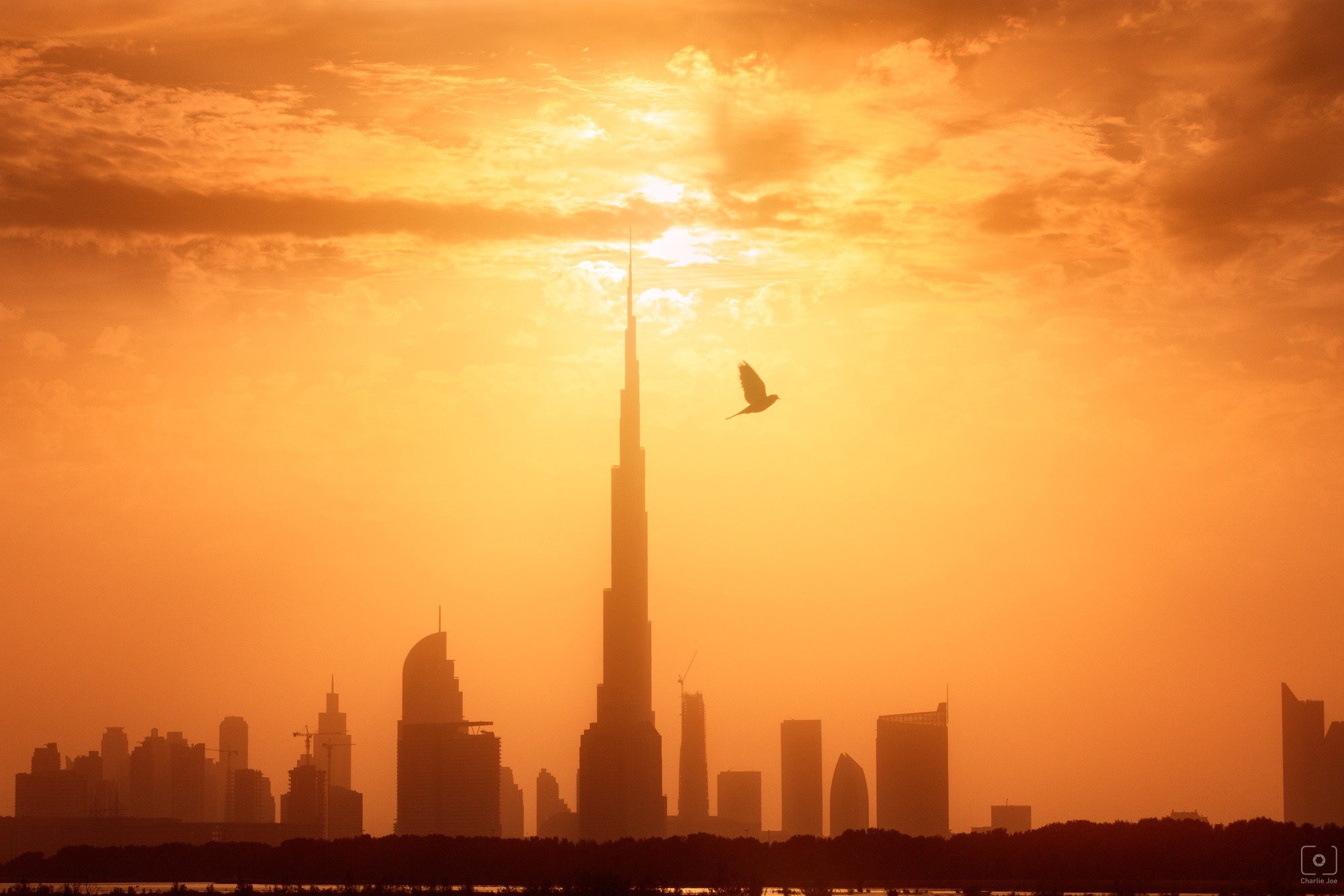 Descarga gratis la imagen Ciudades, Ciudad, Rascacielos, Edificio, Emiratos Árabes Unidos, Atardecer, Hecho Por El Hombre, Dubái en el escritorio de tu PC