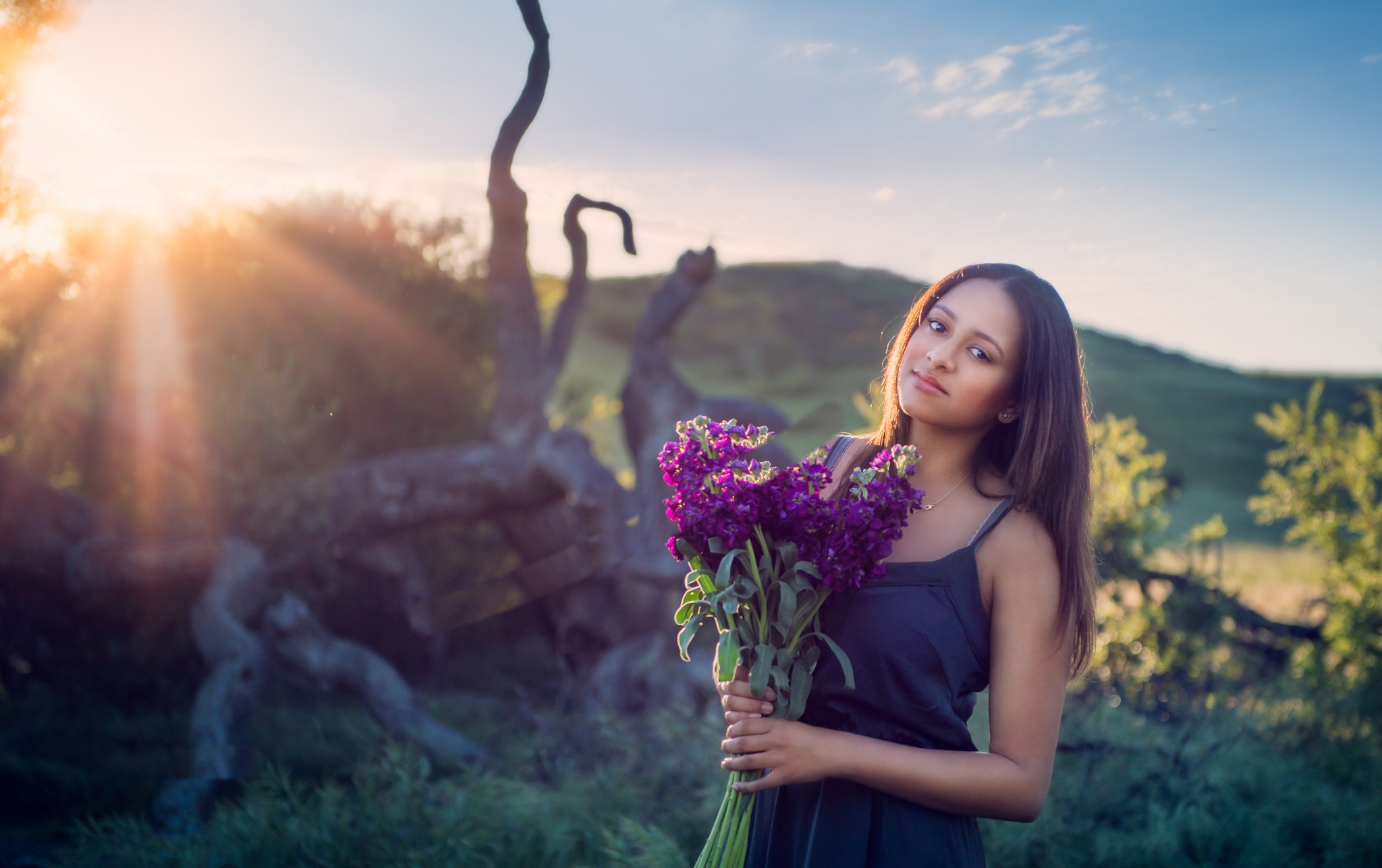 Download mobile wallpaper Flower, Dress, Brunette, Model, Women, Sunbeam, Brown Eyes, Long Hair, Depth Of Field for free.