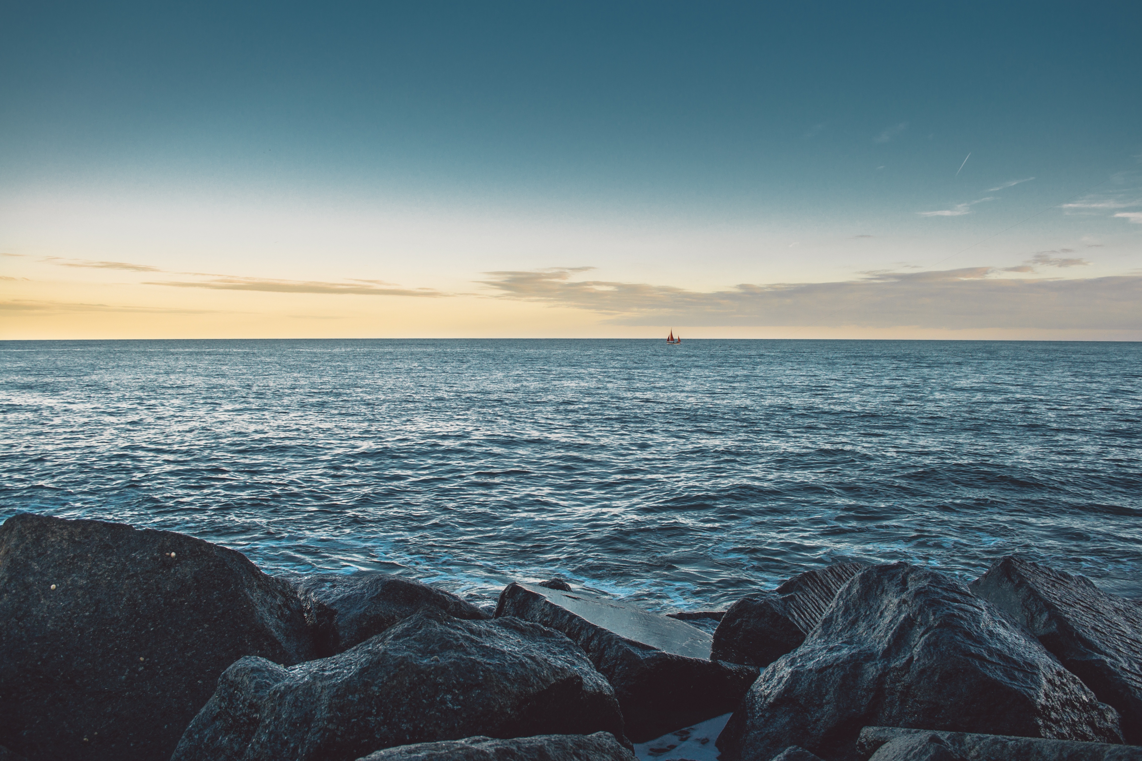 Free download wallpaper Horizon, Stones, Boat, Nature, Sea on your PC desktop