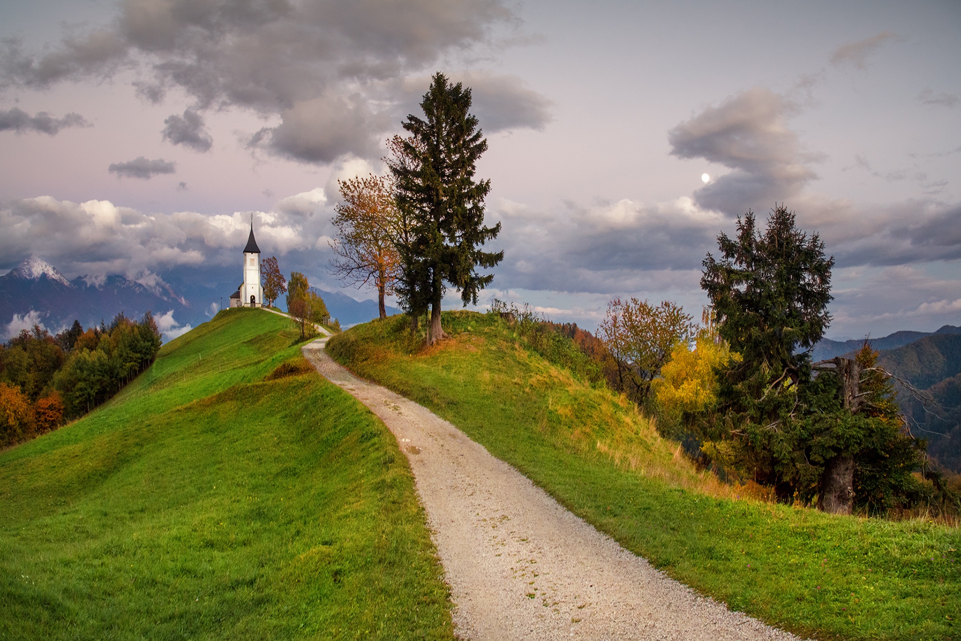 Download mobile wallpaper Road, Fall, Hill, Cloud, Church, Slovenia, Churches, Religious for free.