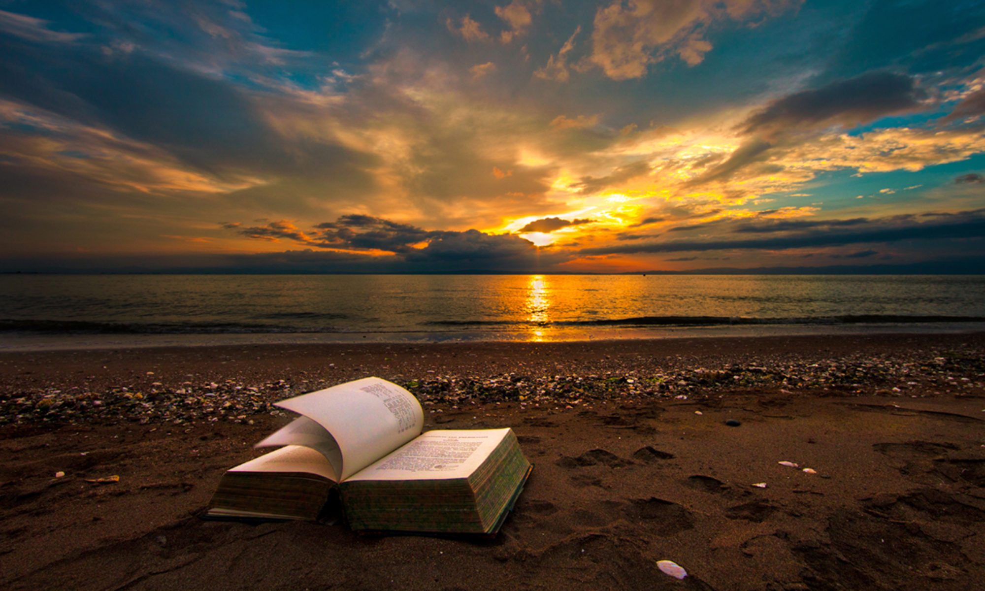 Download mobile wallpaper Sunset, Sea, Beach, Horizon, Ocean, Book, Man Made for free.