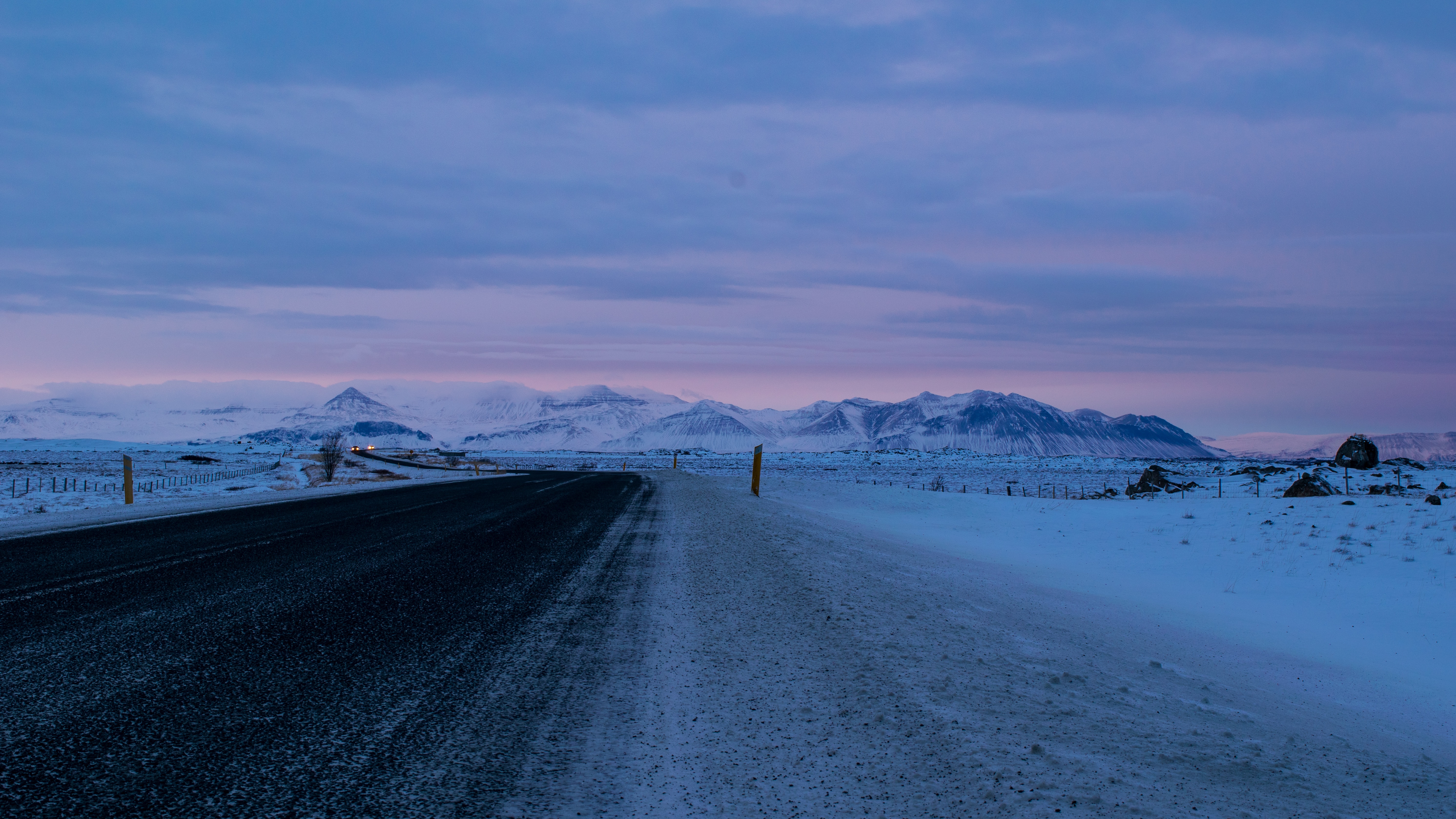 Download mobile wallpaper Snow, Dusk, Twilight, Asphalt, Road, Mountains, Nature for free.