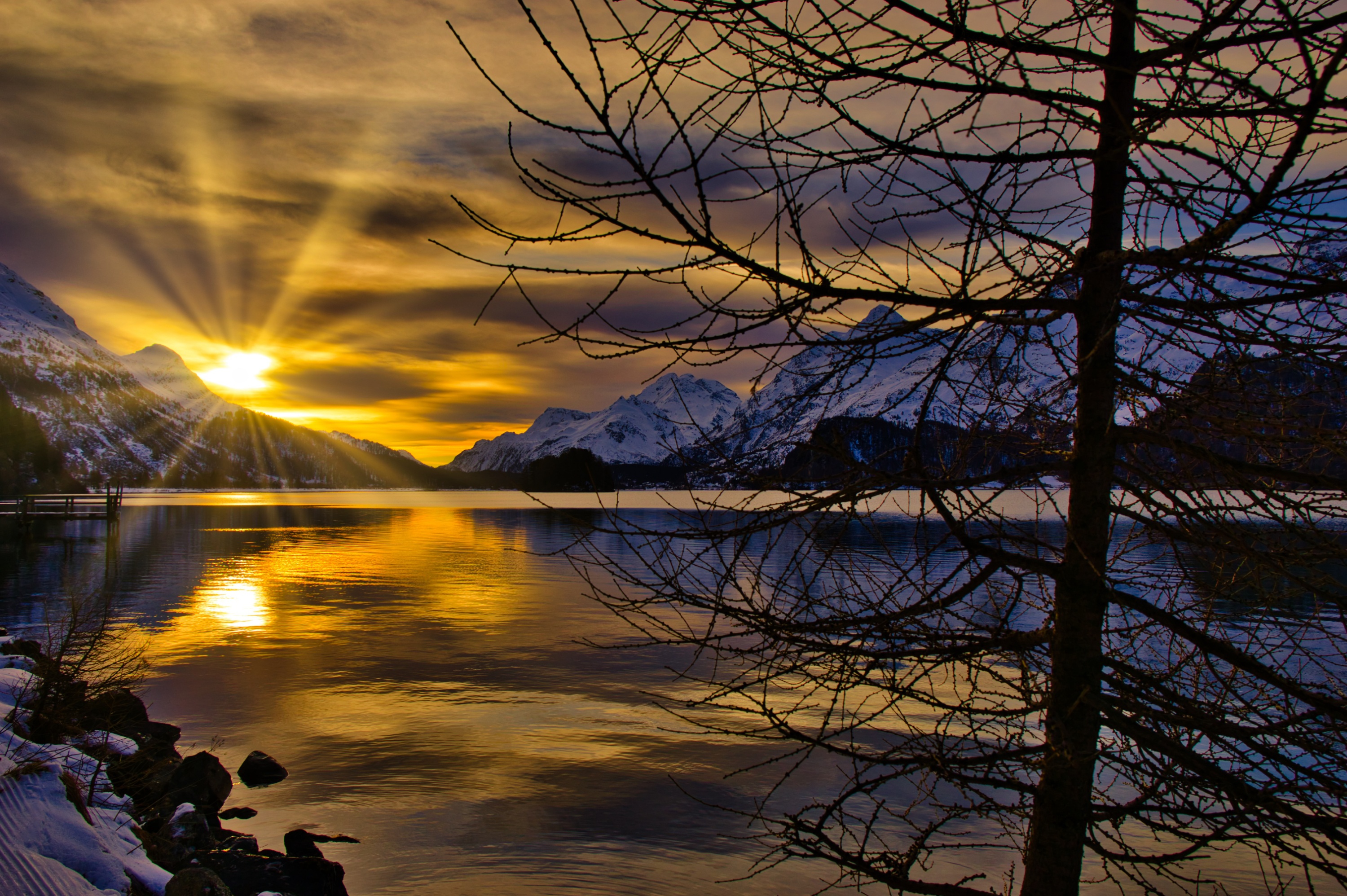 Free download wallpaper Winter, Nature, Sunset, Mountain, Lake, Earth, Switzerland, Sunbeam on your PC desktop