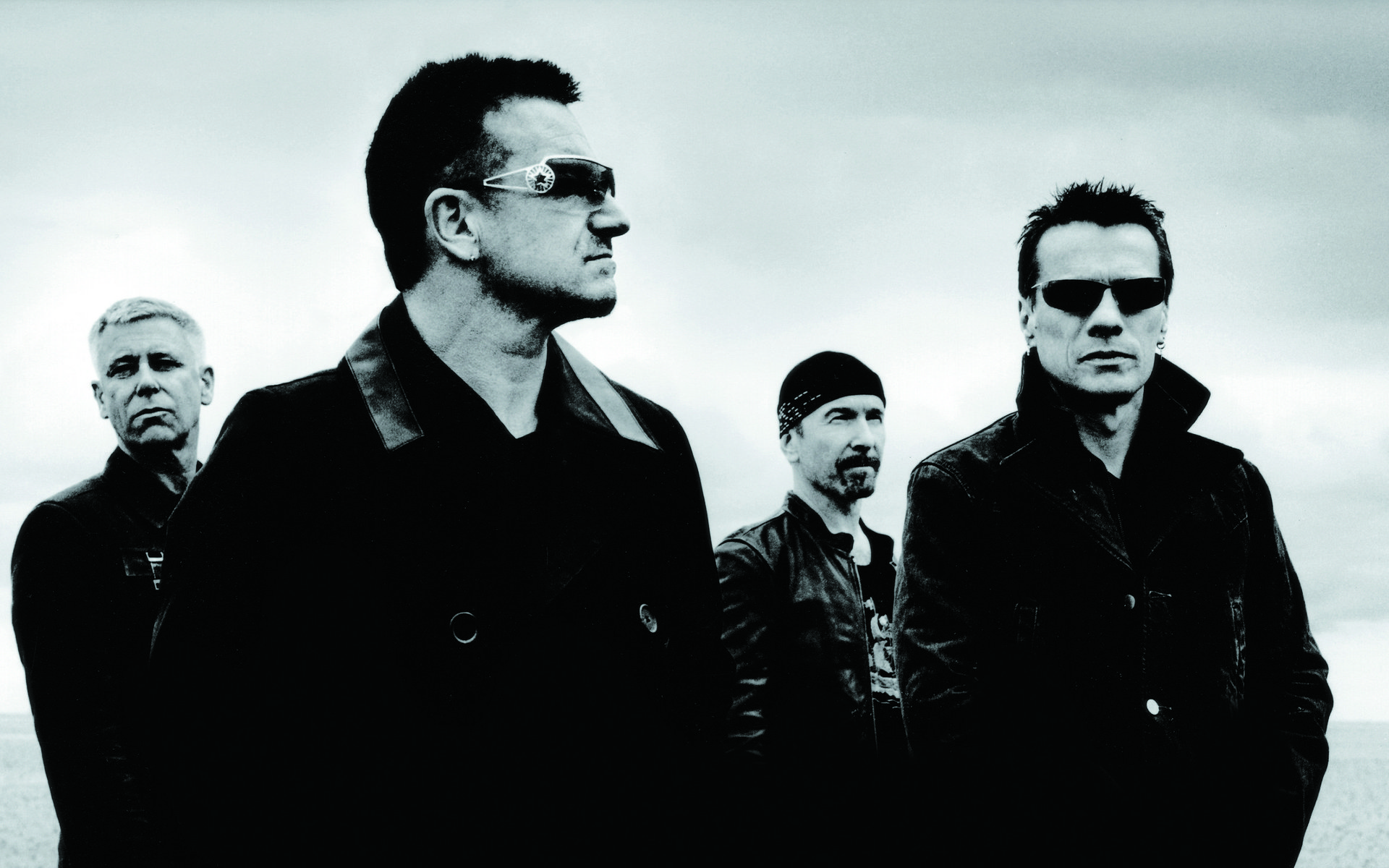 Завантажити шпалери U2 на телефон безкоштовно