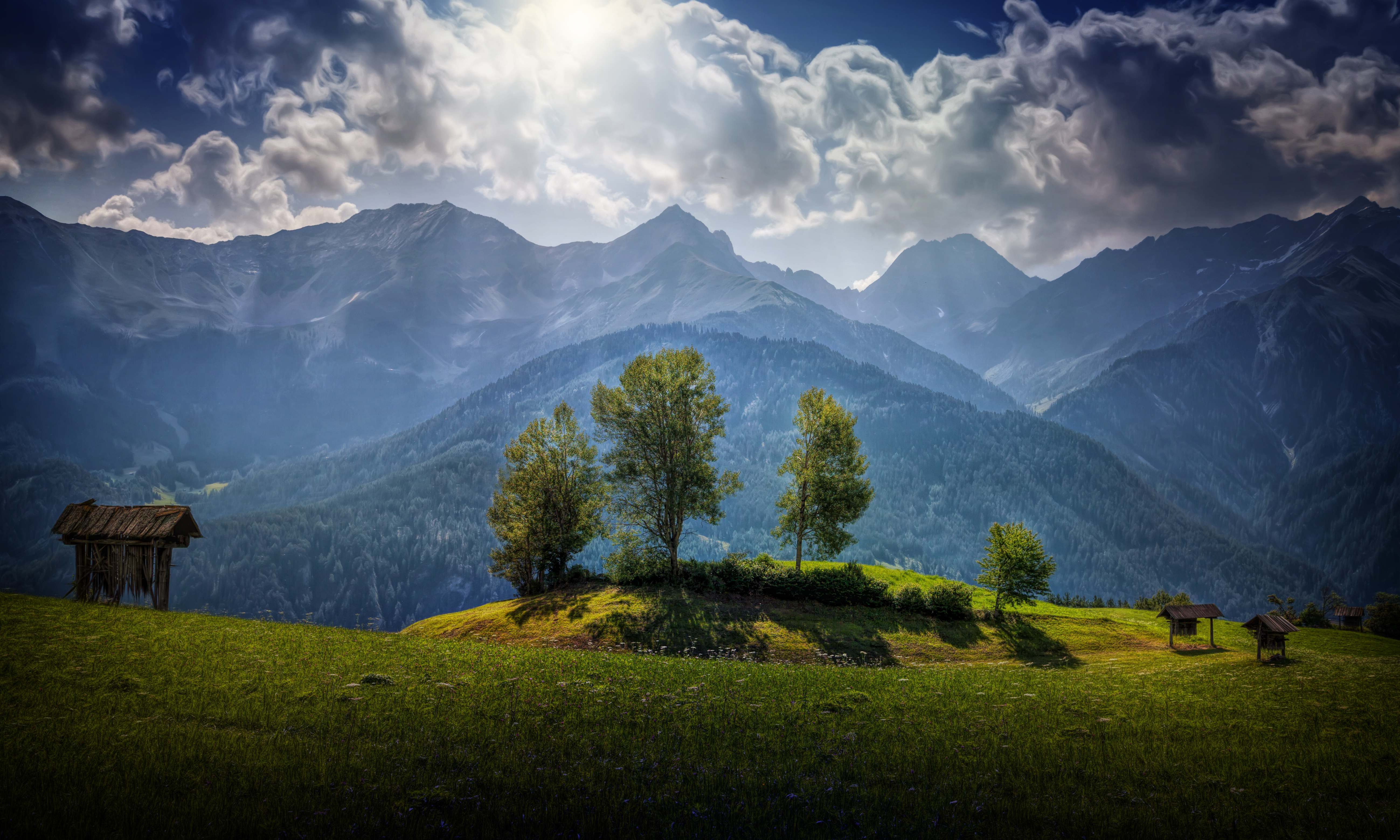Download mobile wallpaper Sky, Mountains, Sun, Mountain, Tree, Earth, Cloud, Sunshine for free.