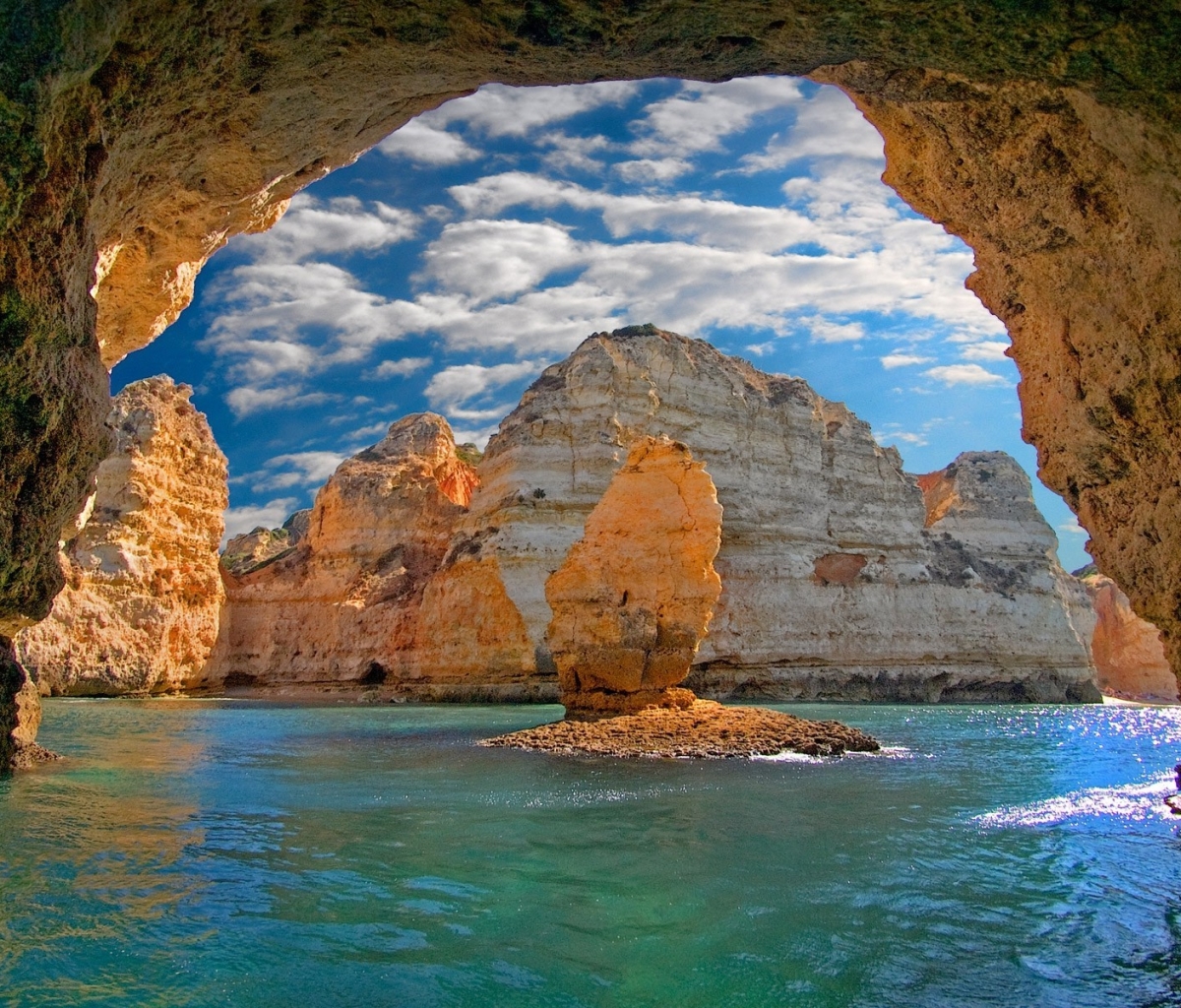 Скачать картинку Океан, Земля, Пещера, Арка, Португалия, Земля/природа в телефон бесплатно.