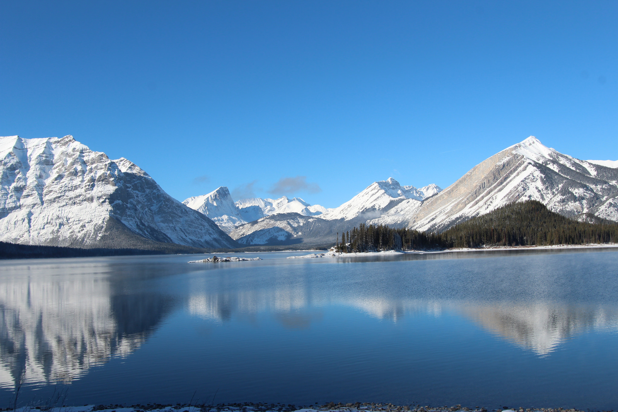 Download mobile wallpaper Winter, Sky, Snow, Mountain, Lake, Reflection, Forest, Earth for free.