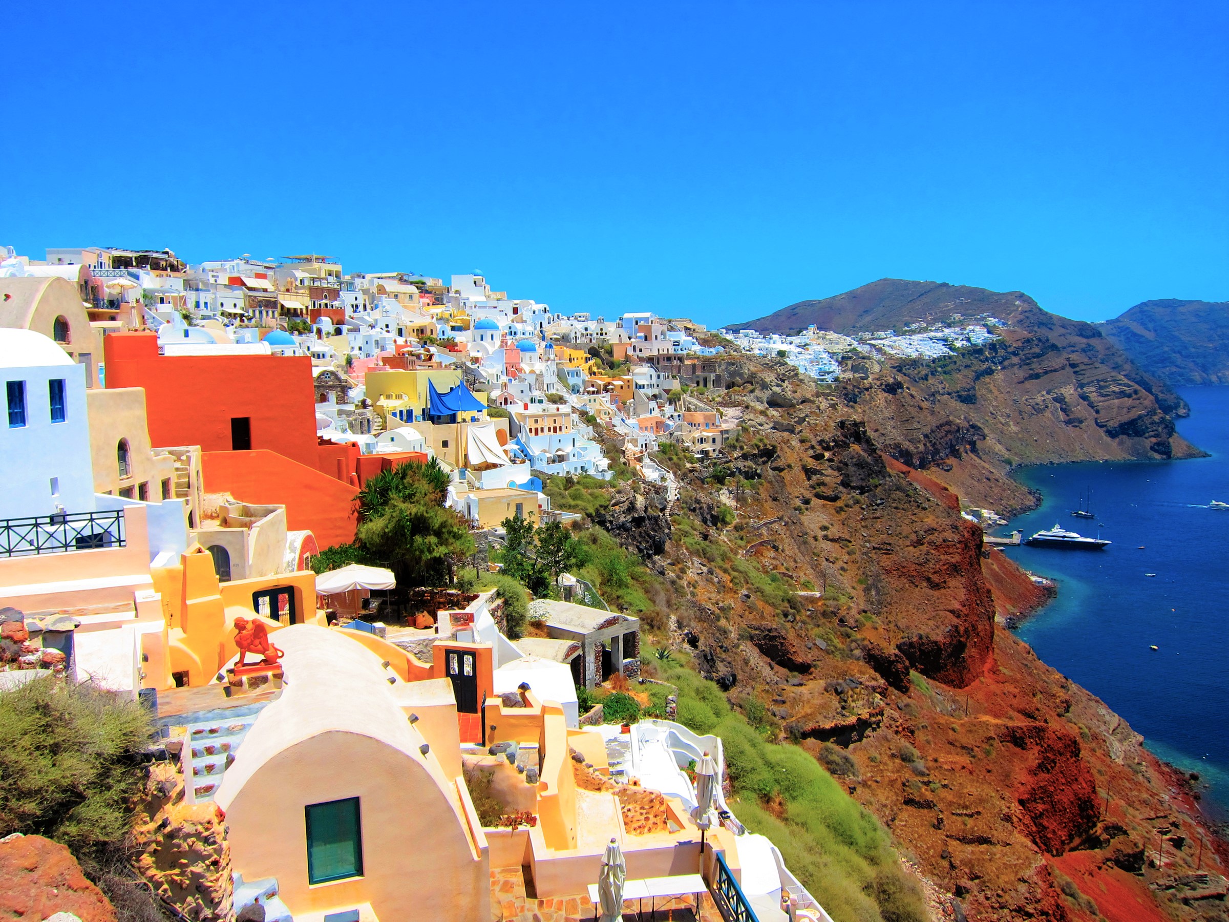 Download mobile wallpaper House, Cliff, Colorful, Greece, Santorini, Man Made, Towns for free.