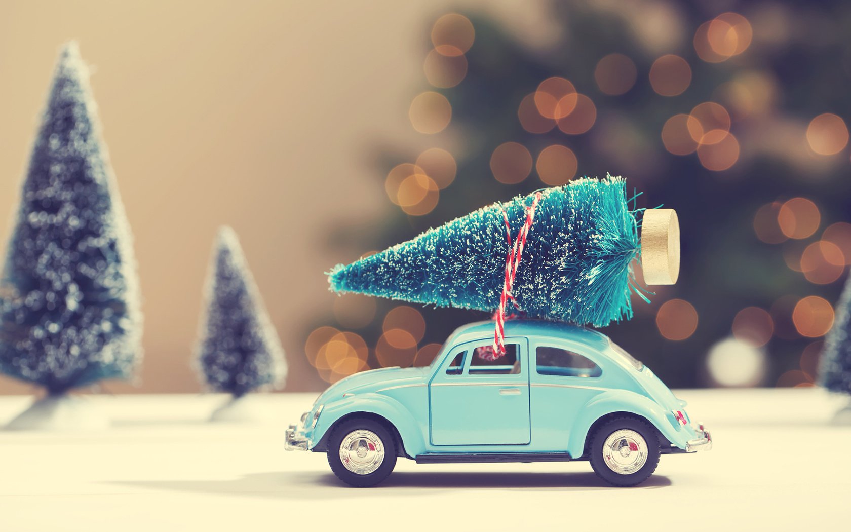 Download mobile wallpaper Car, Christmas, Holiday, Toy, Bokeh for free.