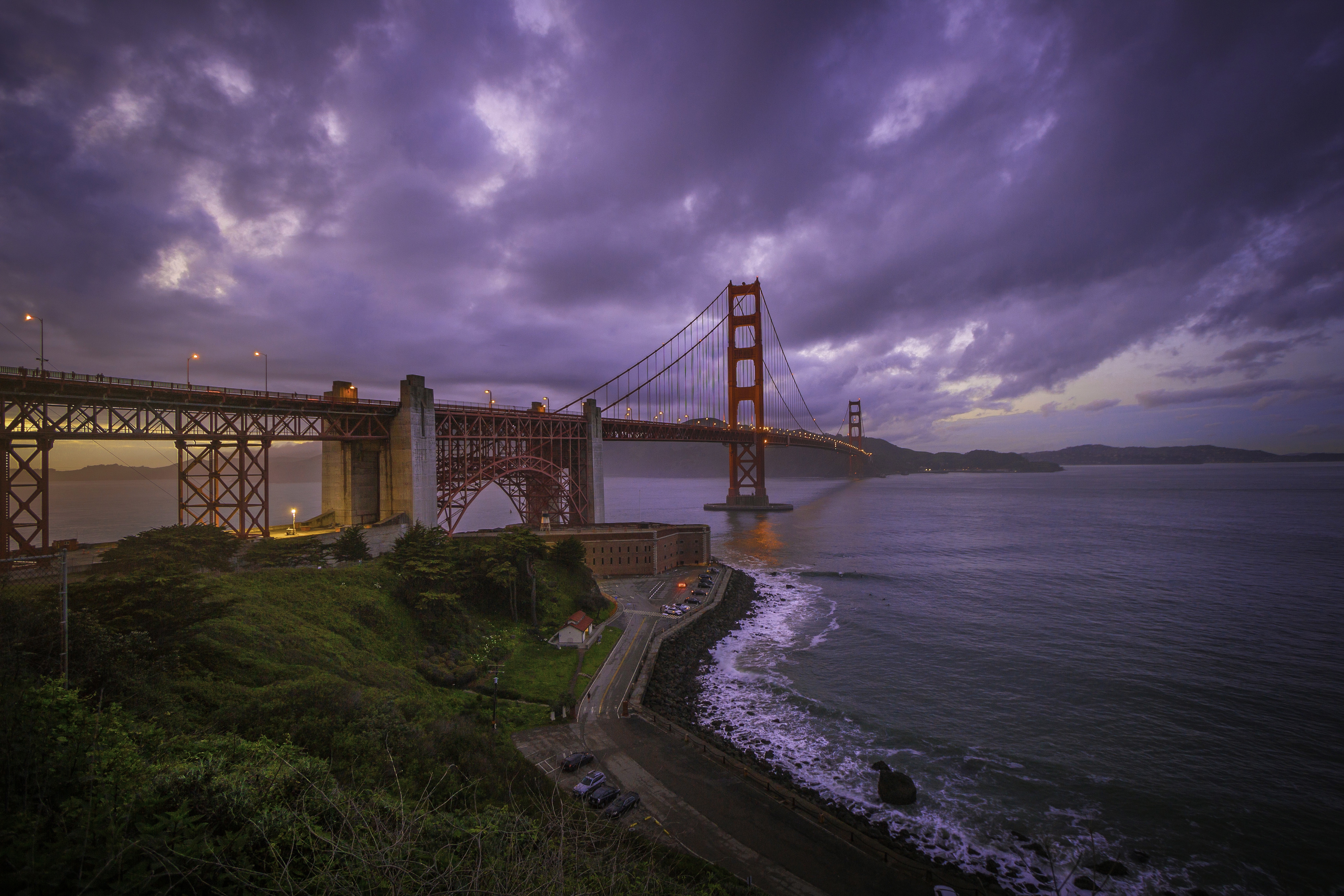 Download mobile wallpaper Bridges, Sea, Ocean, Storm, Cloud, Golden Gate, Man Made for free.