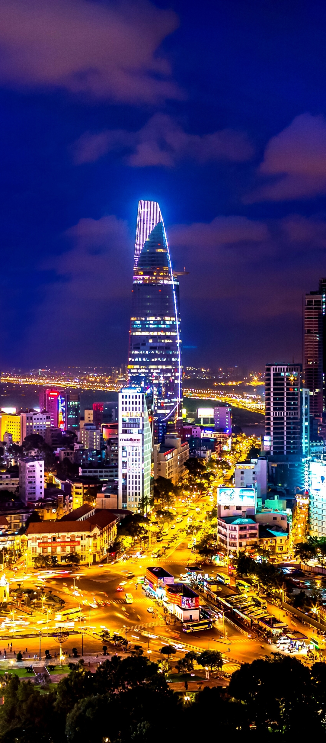Download mobile wallpaper Cities, Night, City, Skyscraper, Building, Light, Cityscape, Vietnam, Ho Chi Minh City, Man Made for free.