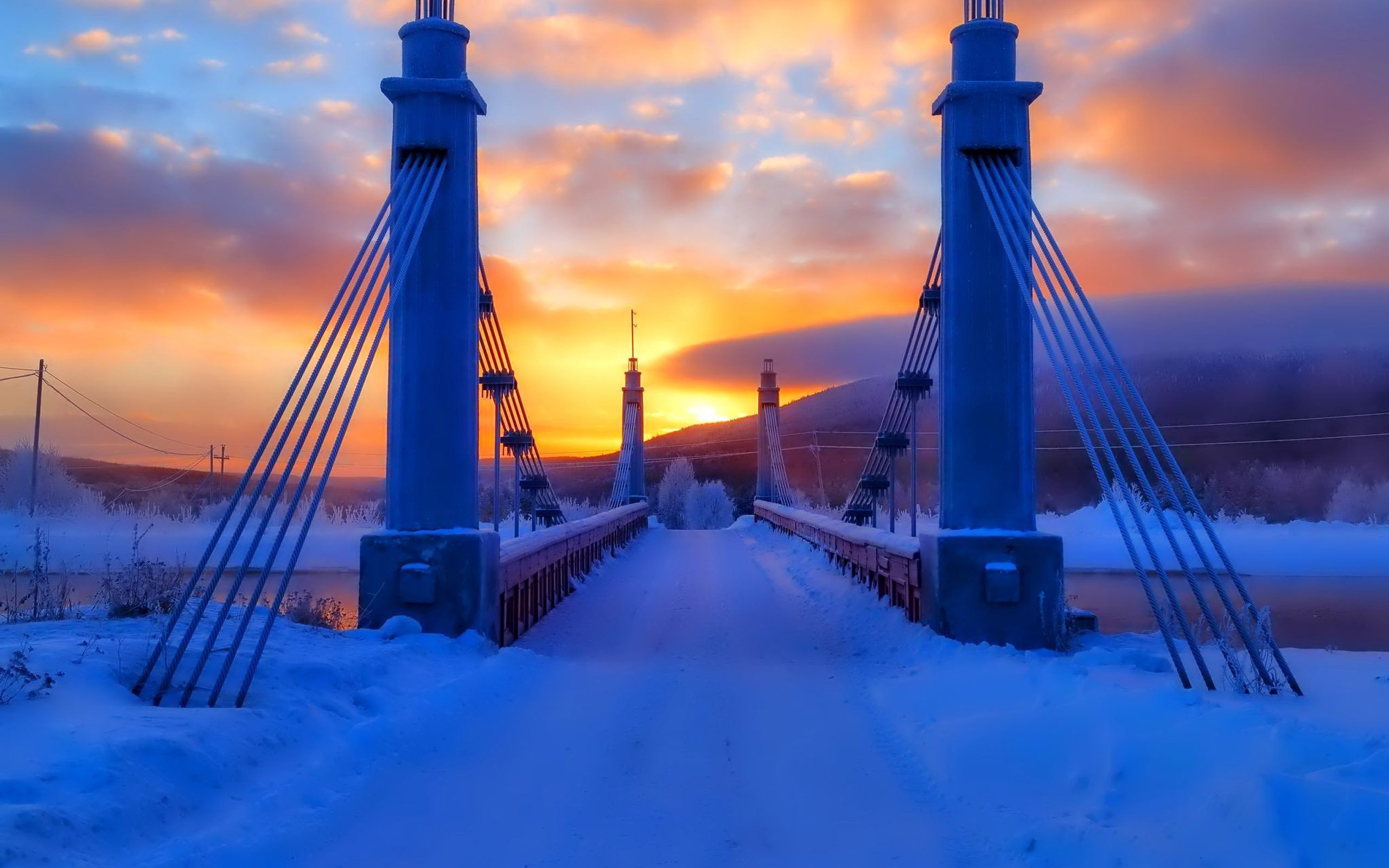 Download mobile wallpaper Winter, Bridges, Sunset, Sky, Snow, Bridge, Man Made for free.